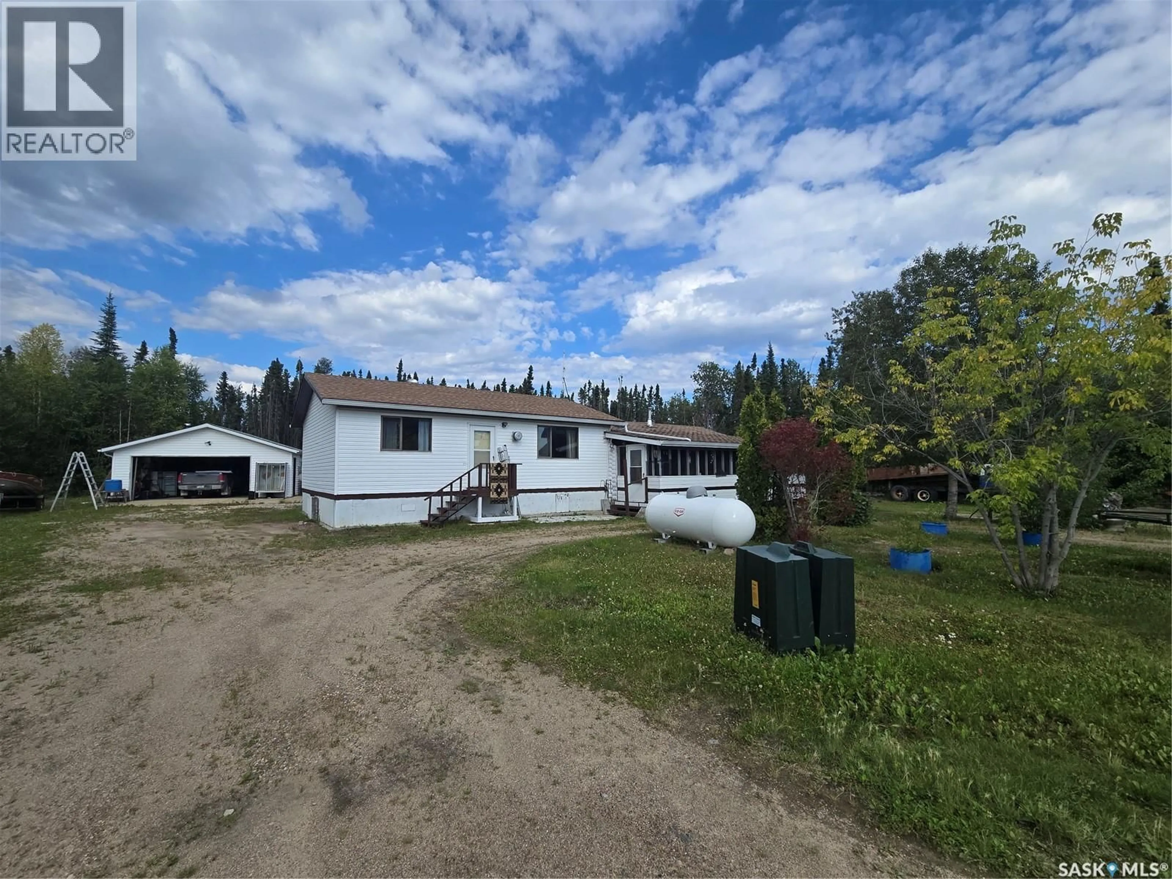 A pic from outside/outdoor area/front of a property/back of a property/a pic from drone, building for 12 LAKEVIEW DRIVE, Northern Admin District Saskatchewan S0J1W0