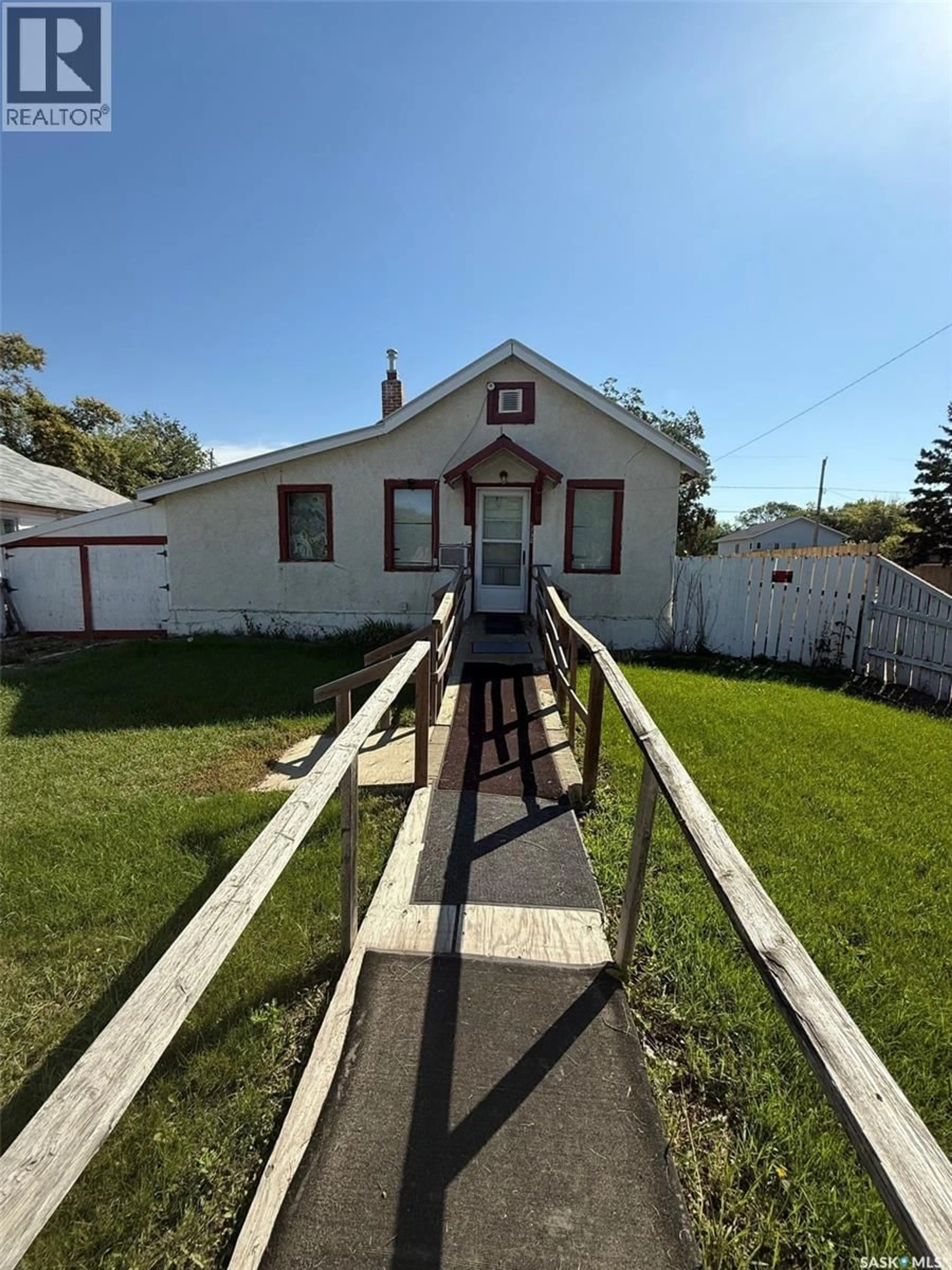 A pic from outside/outdoor area/front of a property/back of a property/a pic from drone, street for 1202 108TH STREET, North Battleford Saskatchewan S9A2B4