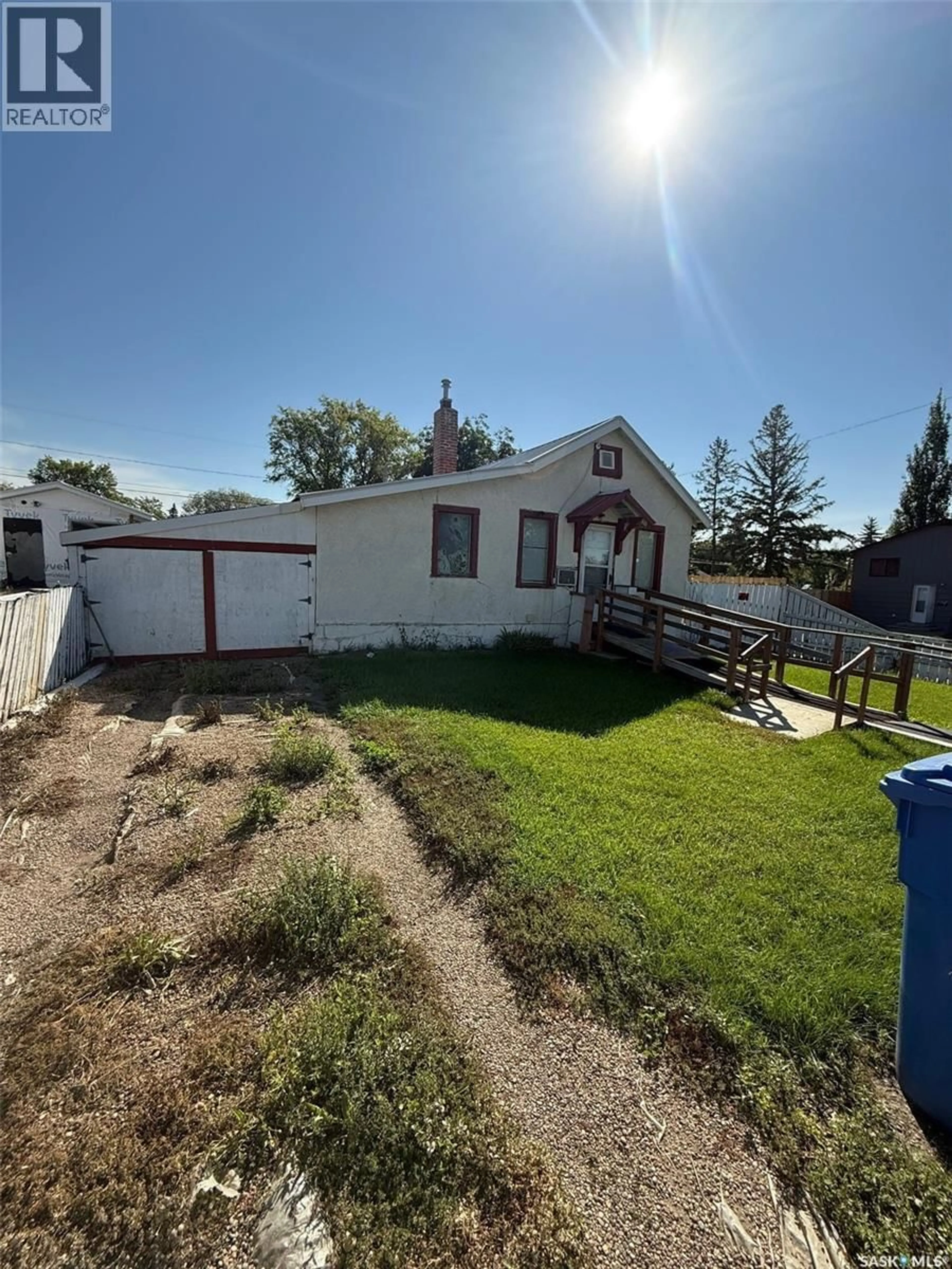 A pic from outside/outdoor area/front of a property/back of a property/a pic from drone, street for 1202 108TH STREET, North Battleford Saskatchewan S9A2B4