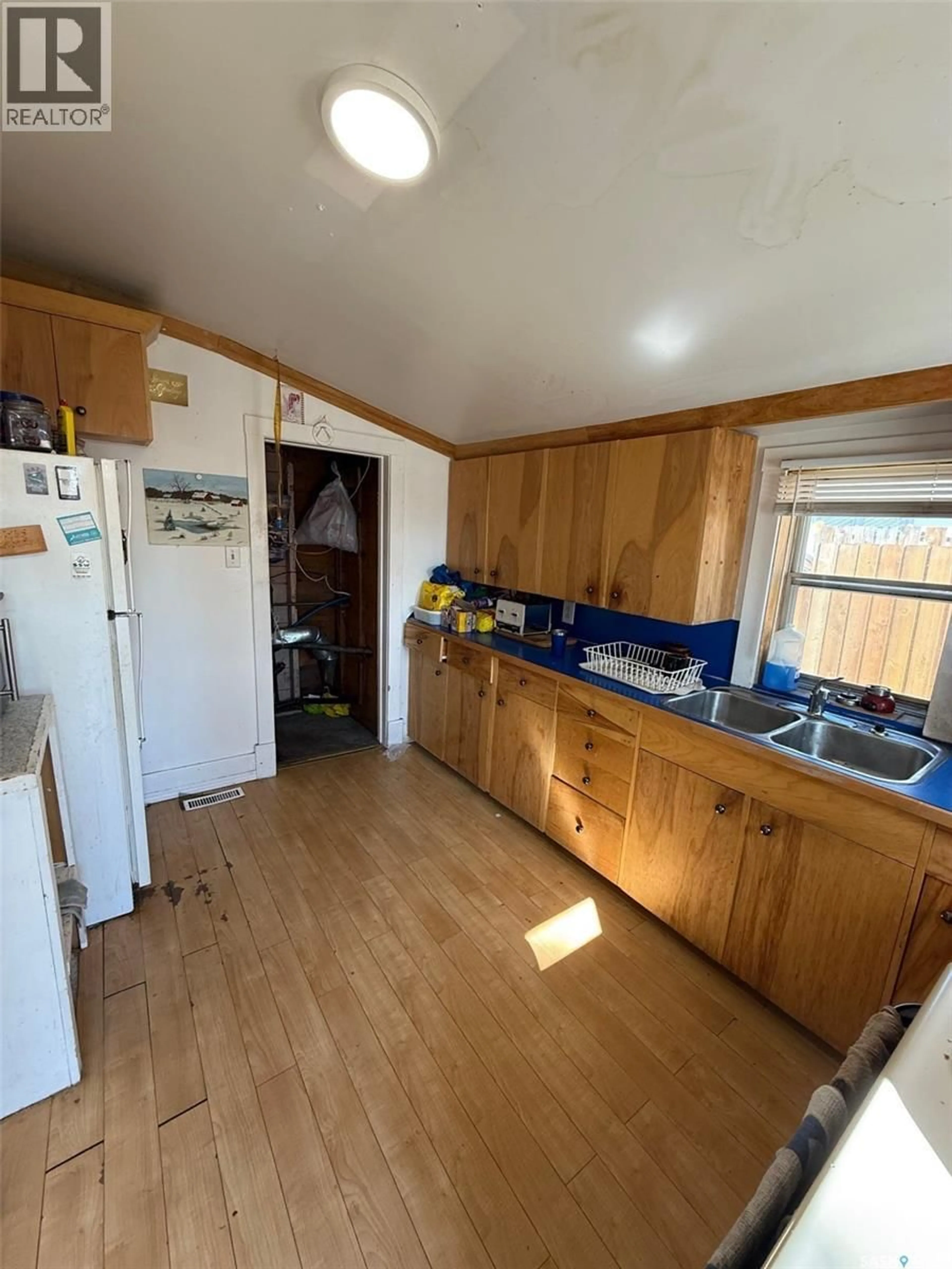 Standard kitchen, wood/laminate floor for 1202 108TH STREET, North Battleford Saskatchewan S9A2B4