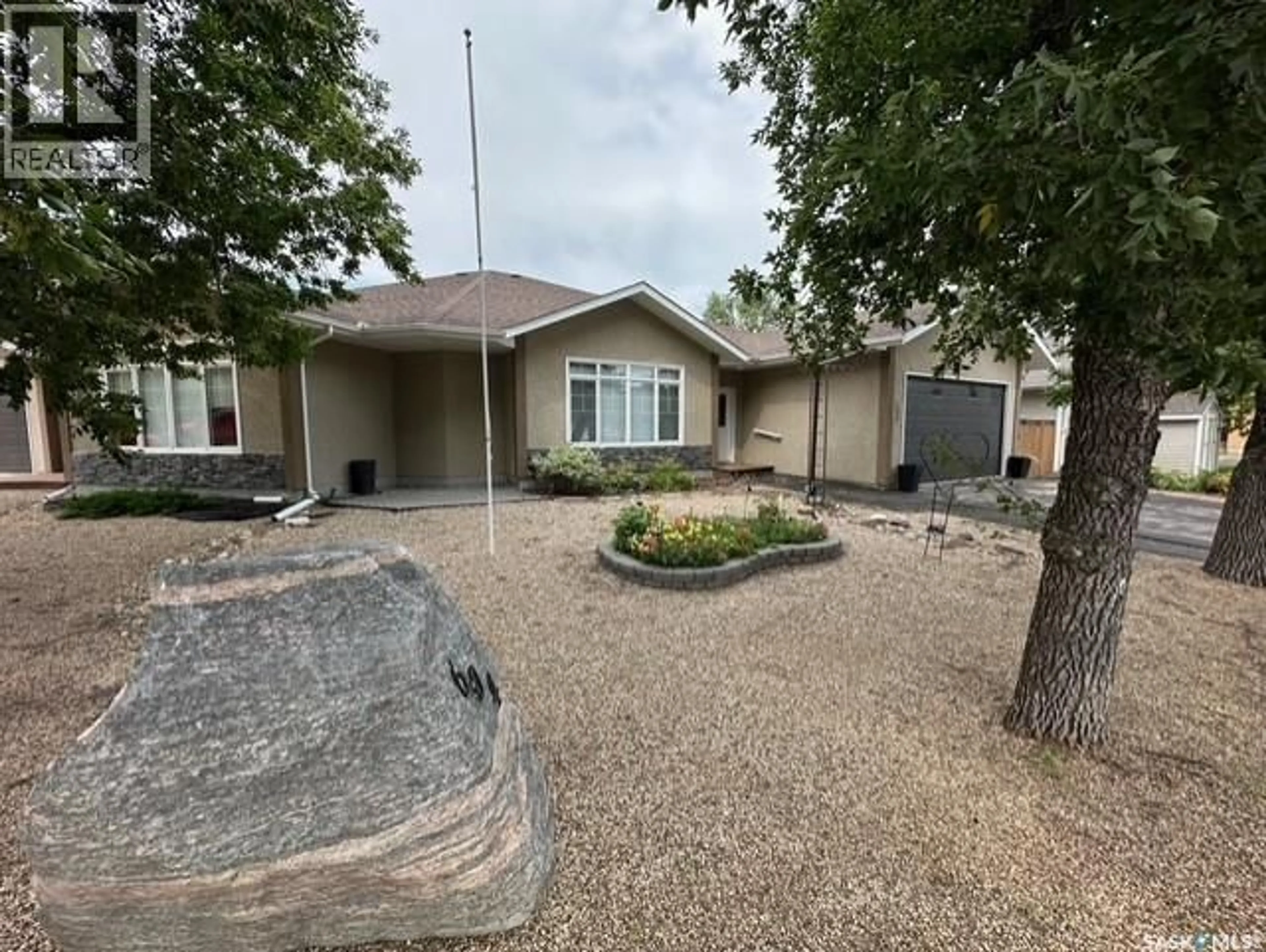 A pic from outside/outdoor area/front of a property/back of a property/a pic from drone, street for 604 CENTRE STREET, Assiniboia Saskatchewan S0H0B0