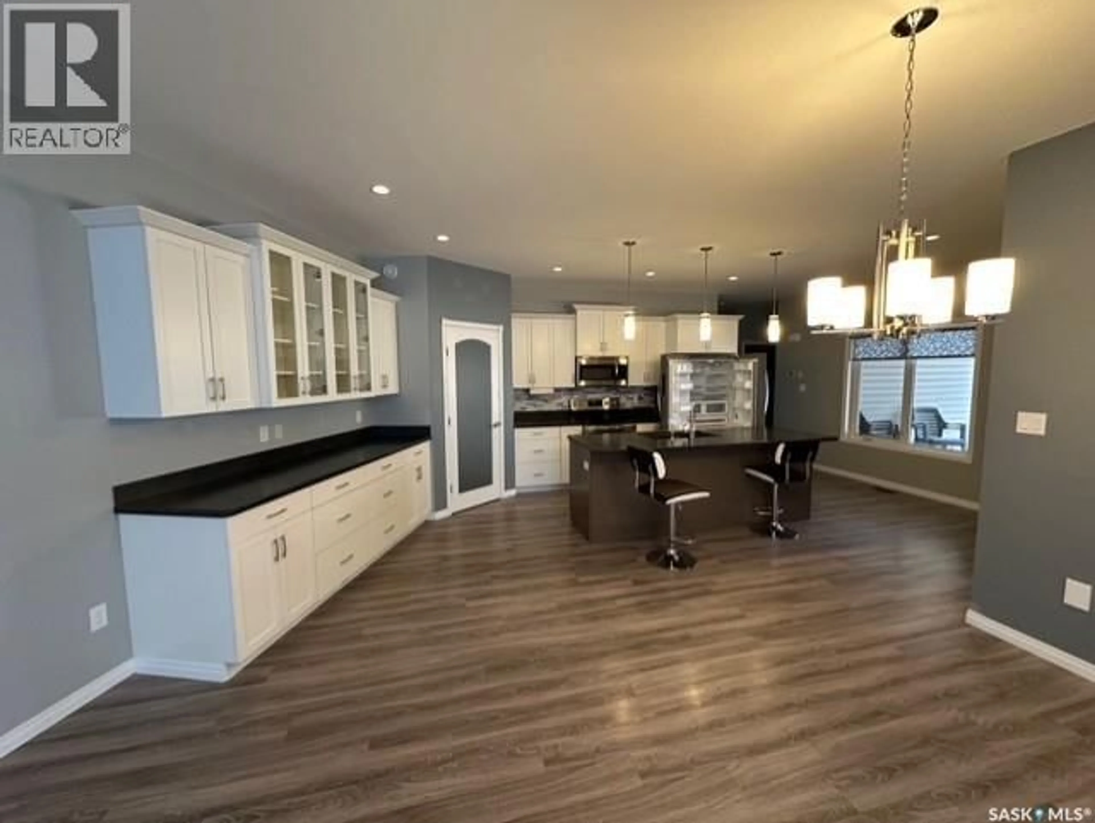 Open concept kitchen, unknown for 604 CENTRE STREET, Assiniboia Saskatchewan S0H0B0