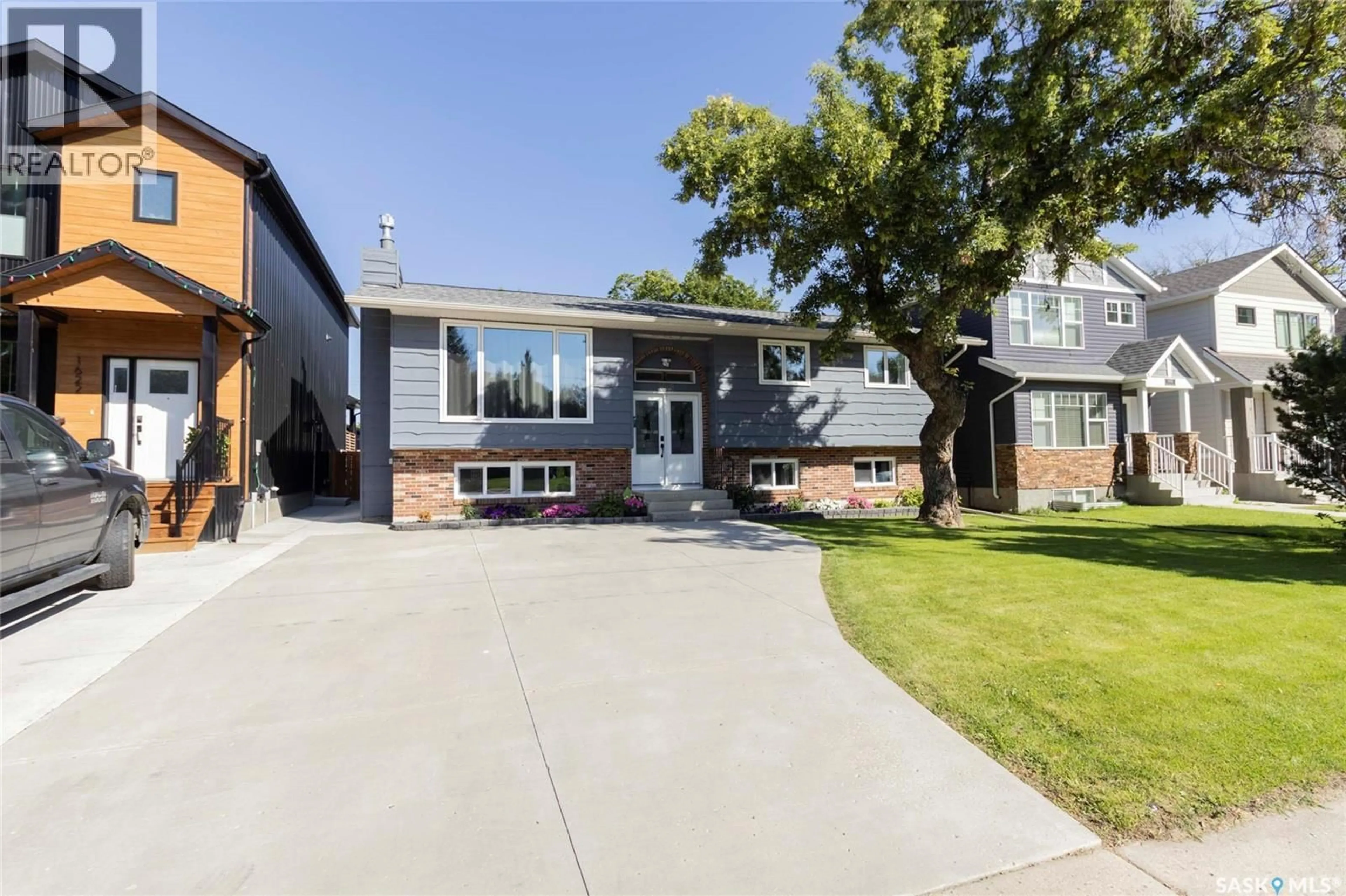 Home with vinyl exterior material, street for 1618 ALEXANDRA AVENUE, Saskatoon Saskatchewan S7K3C3