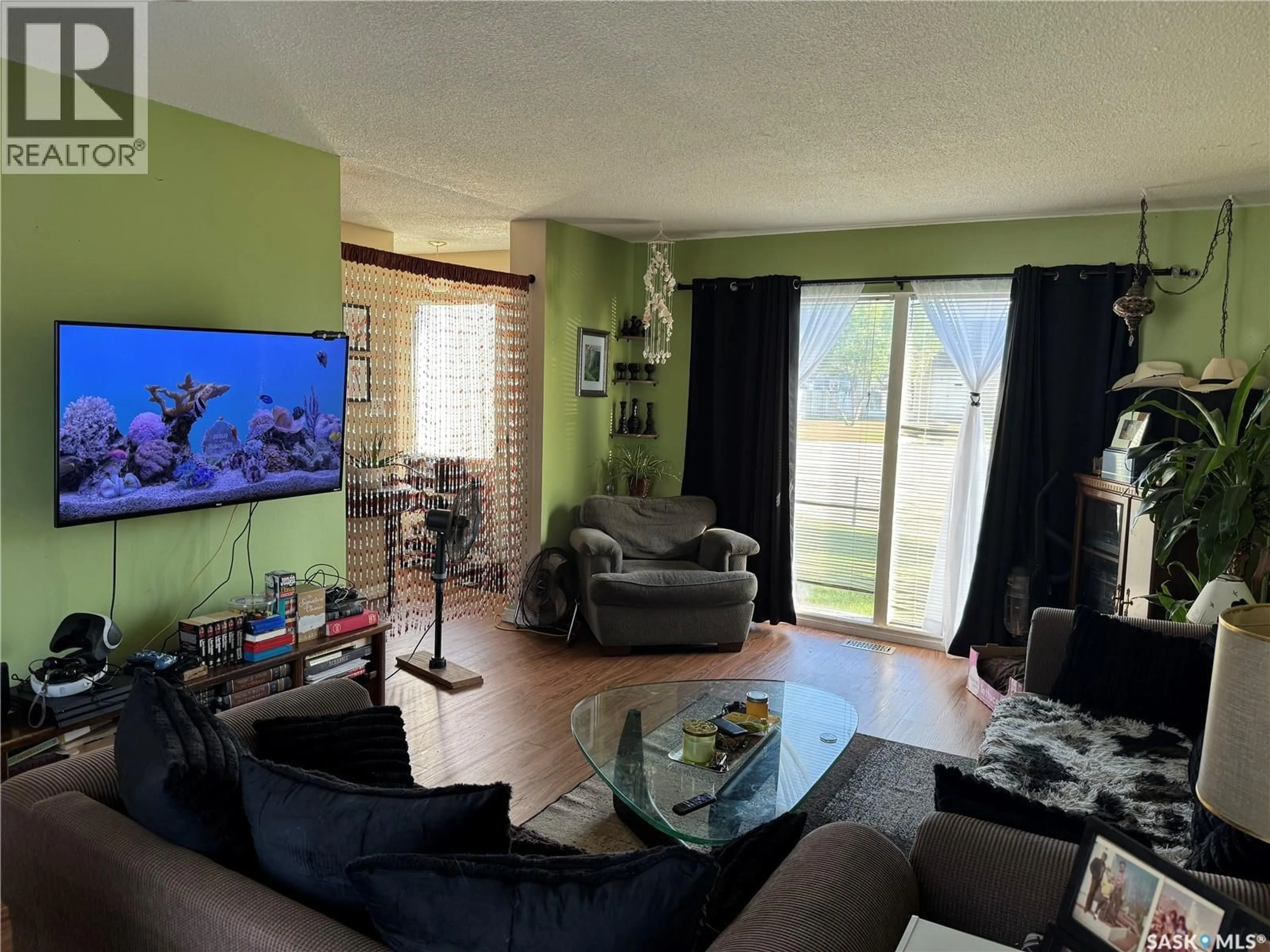 Living room with furniture, unknown for 9A & 9B MAPLE PLACE, Lanigan Saskatchewan S0K2M0