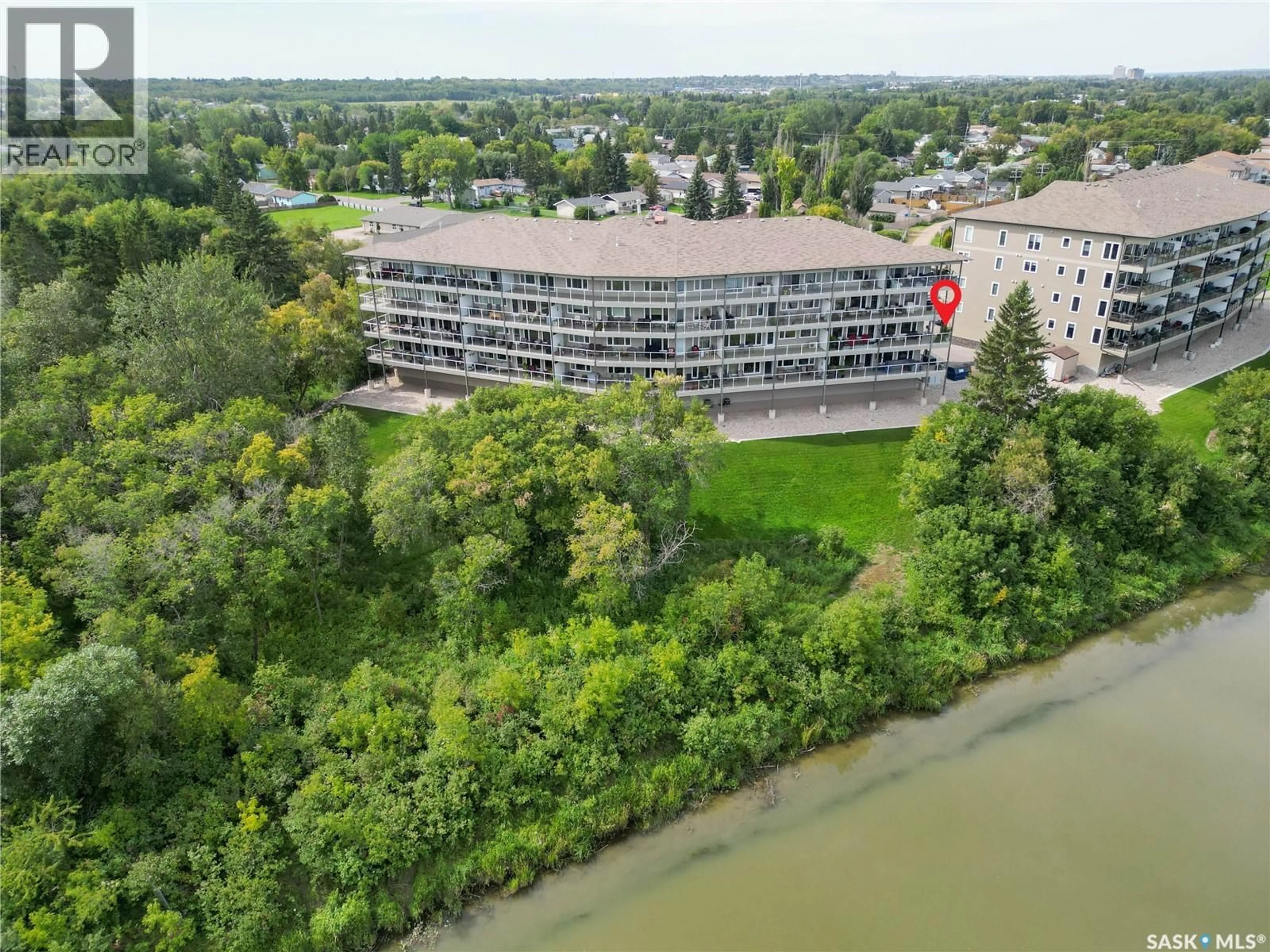 A pic from outside/outdoor area/front of a property/back of a property/a pic from drone, water/lake/river/ocean view for 301 - 1602 1ST STREET, Prince Albert Saskatchewan S6V1G7