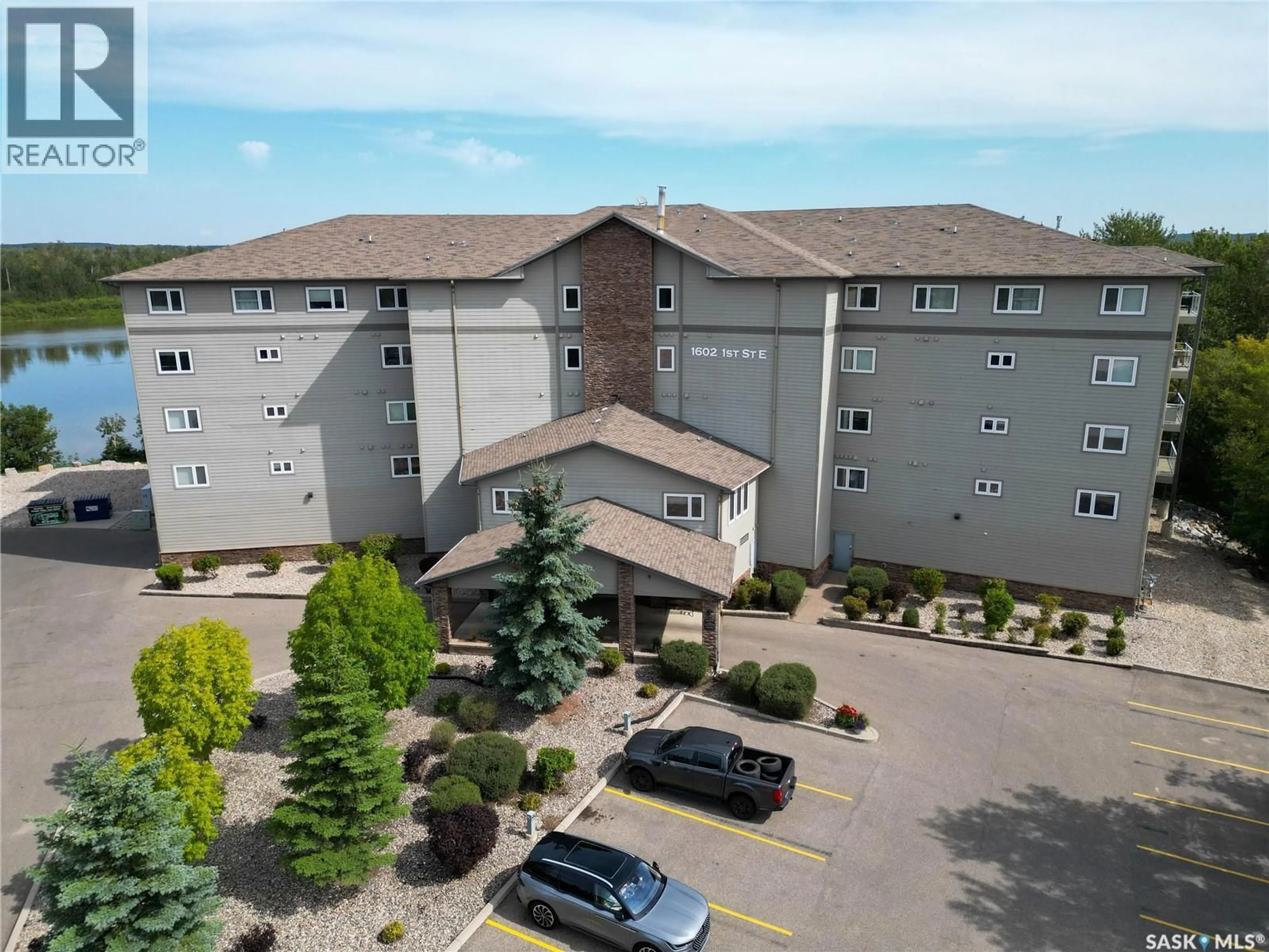 A pic from outside/outdoor area/front of a property/back of a property/a pic from drone, building for 301 - 1602 1ST STREET, Prince Albert Saskatchewan S6V1G7