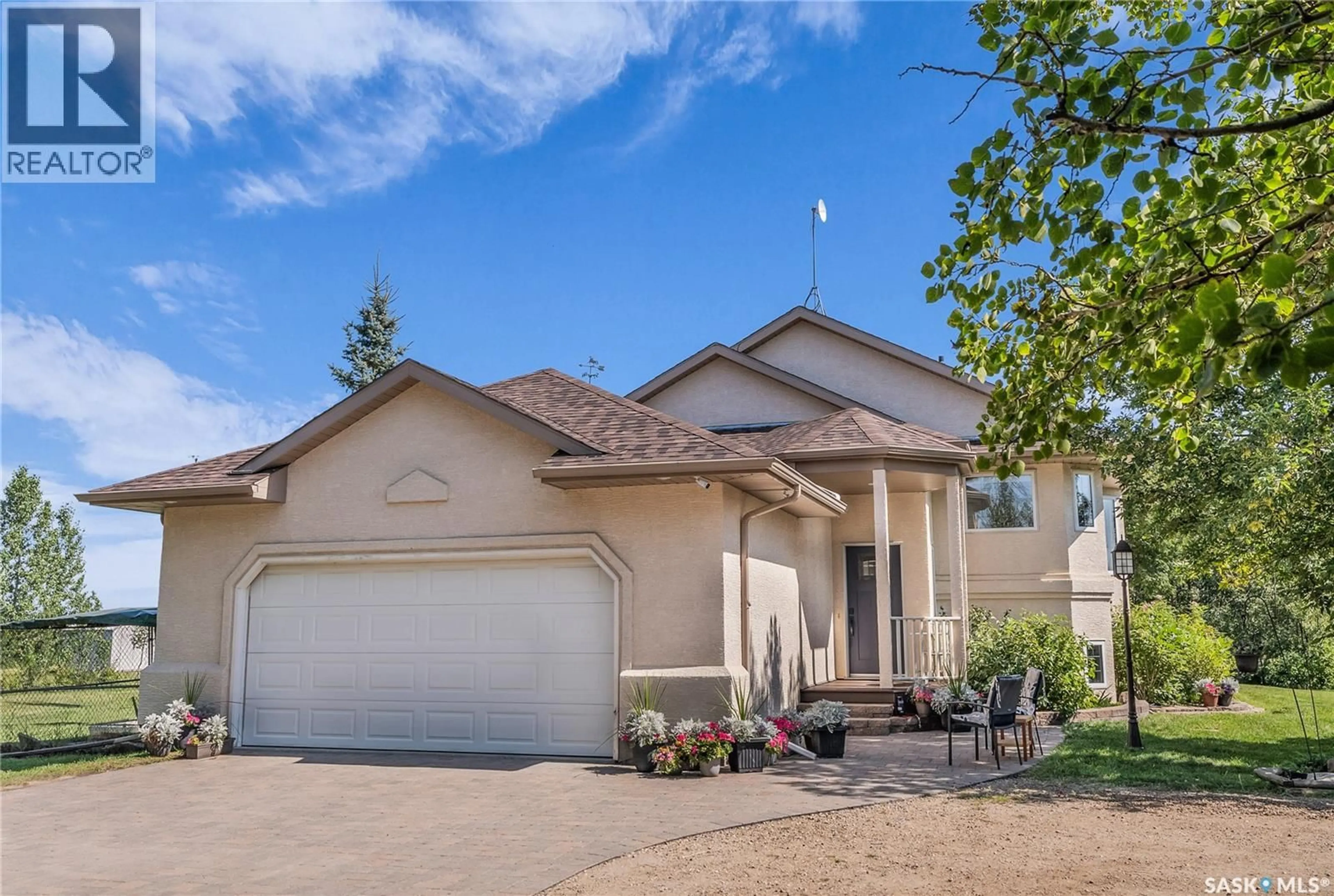 Home with vinyl exterior material, street for SCHNEIDER ACREAGE, Aberdeen Rm No. 373 Saskatchewan S7K3J9