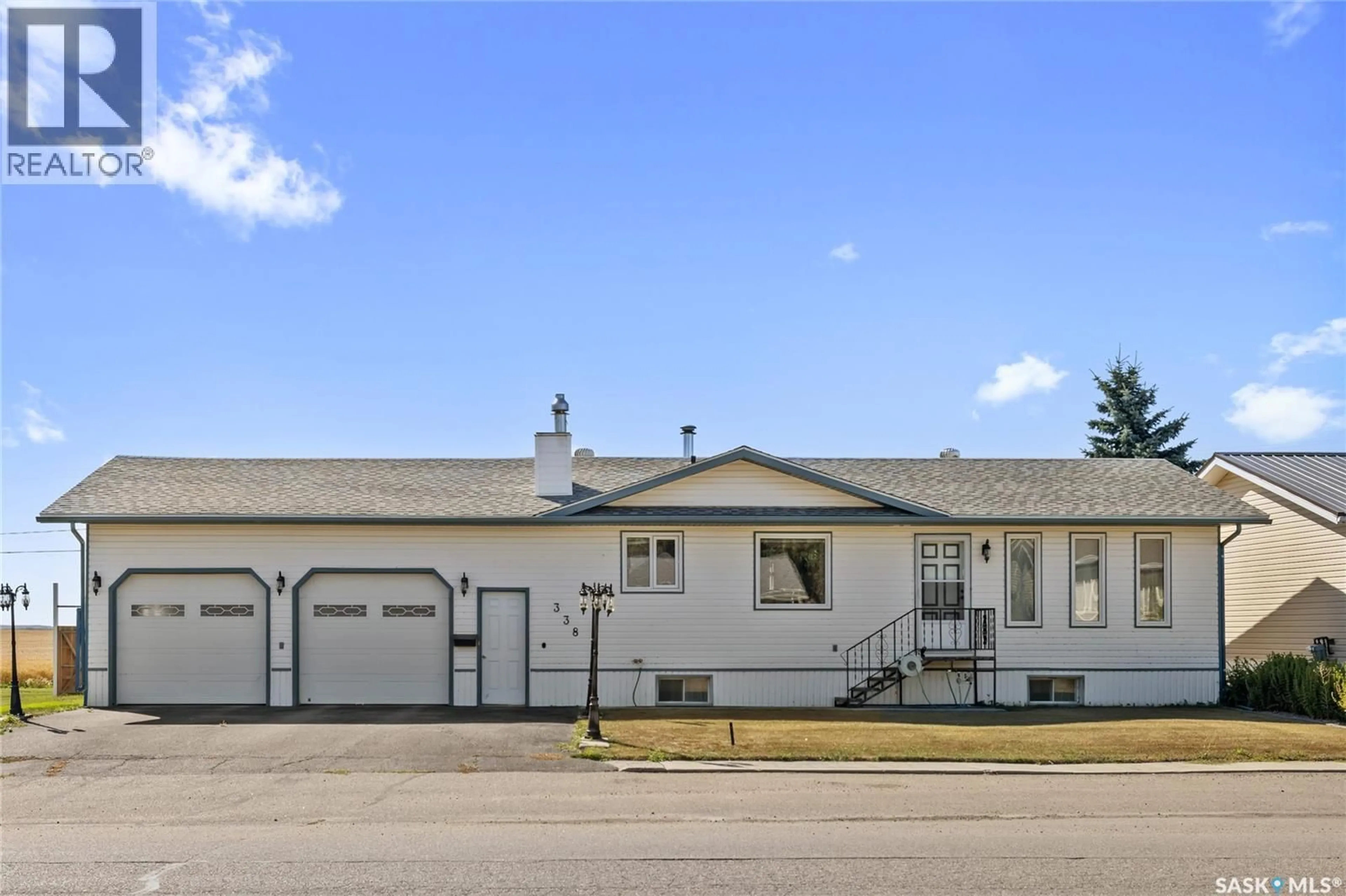 Home with vinyl exterior material, street for 338 2ND AVENUE, Montmartre Saskatchewan S0G3M0