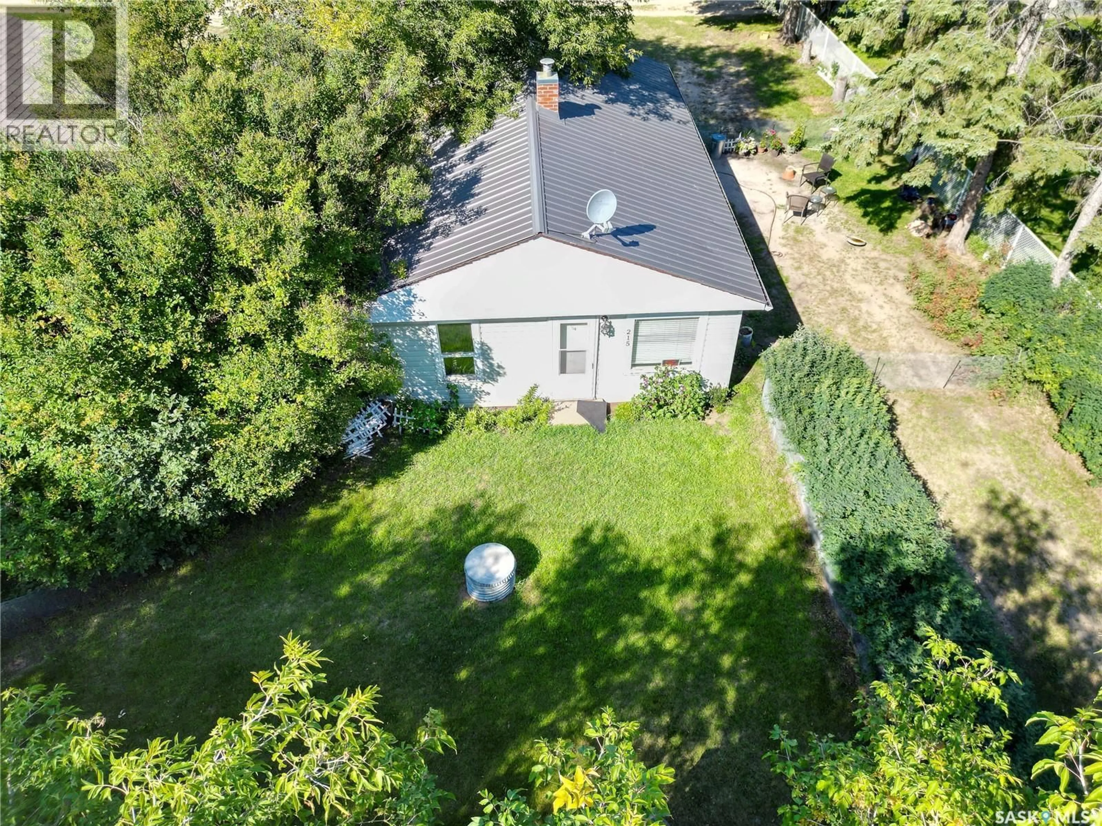 A pic from outside/outdoor area/front of a property/back of a property/a pic from drone, street for 215 REDWING ROAD, Buckland Rm No. 491 Saskatchewan S6V5R3