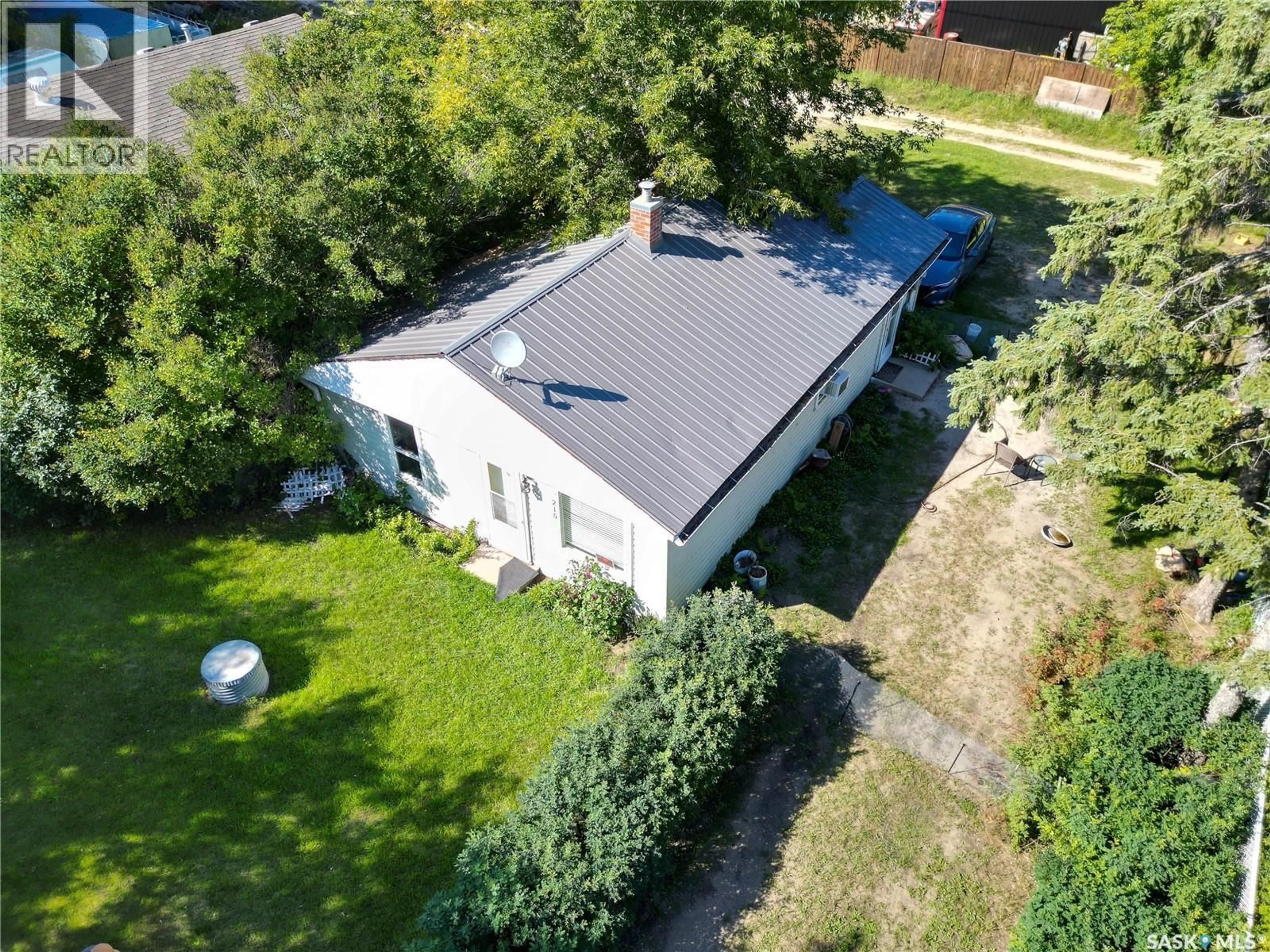 A pic from outside/outdoor area/front of a property/back of a property/a pic from drone, building for 215 REDWING ROAD, Buckland Rm No. 491 Saskatchewan S6V5R3