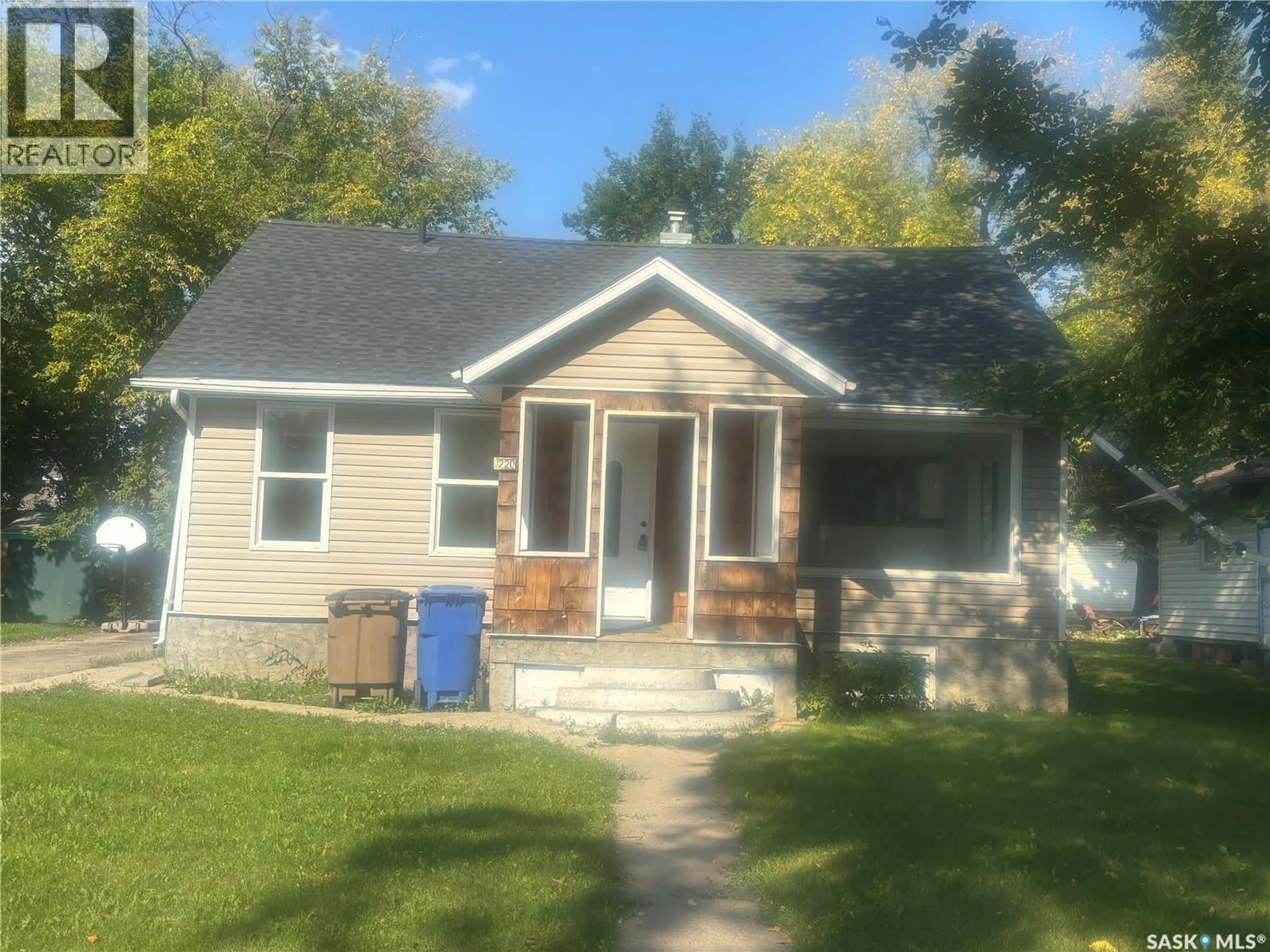 Home with vinyl exterior material, street for 220 STOVEL AVENUE, Melfort Saskatchewan S0E1A0