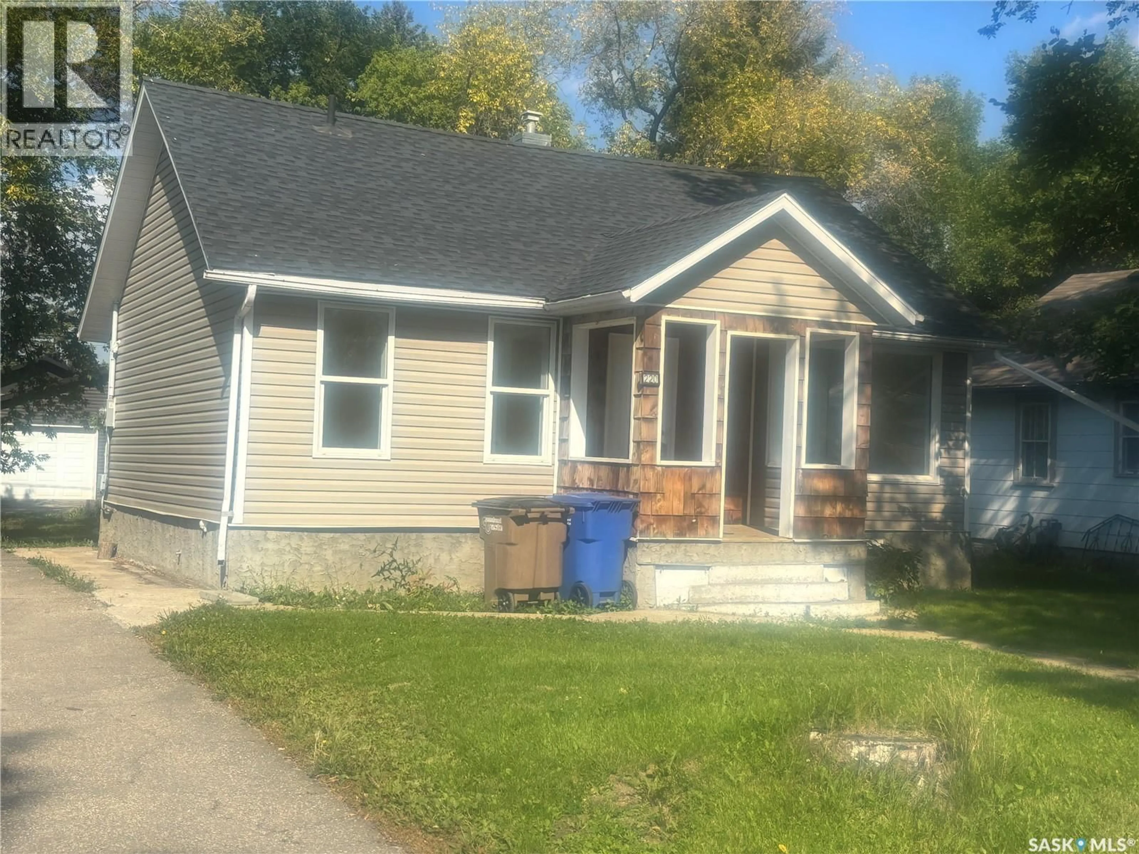 Home with vinyl exterior material, street for 220 STOVEL AVENUE, Melfort Saskatchewan S0E1A0