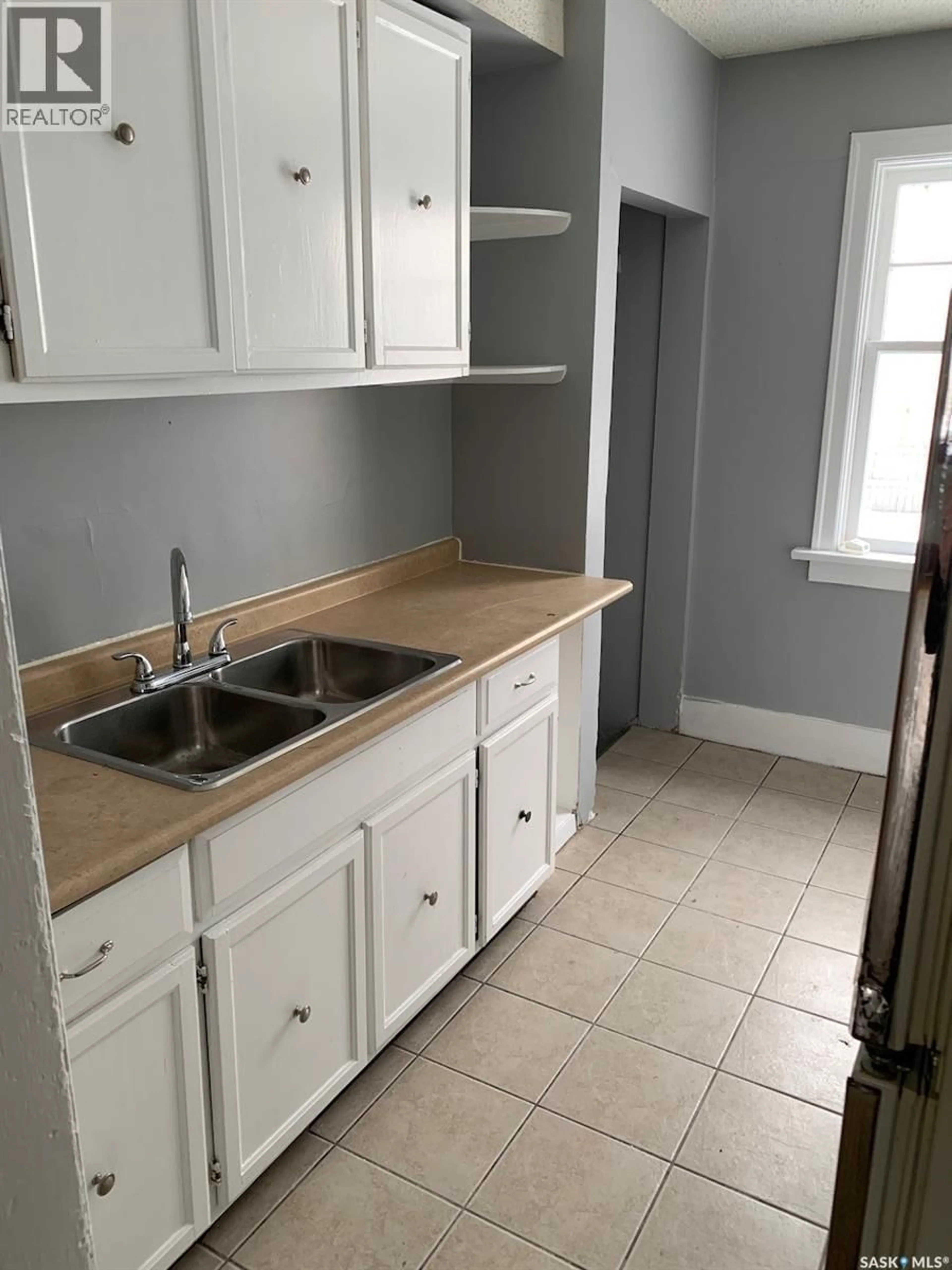 Standard kitchen, ceramic/tile floor for 1569 RAE STREET, Regina Saskatchewan S4T2C8