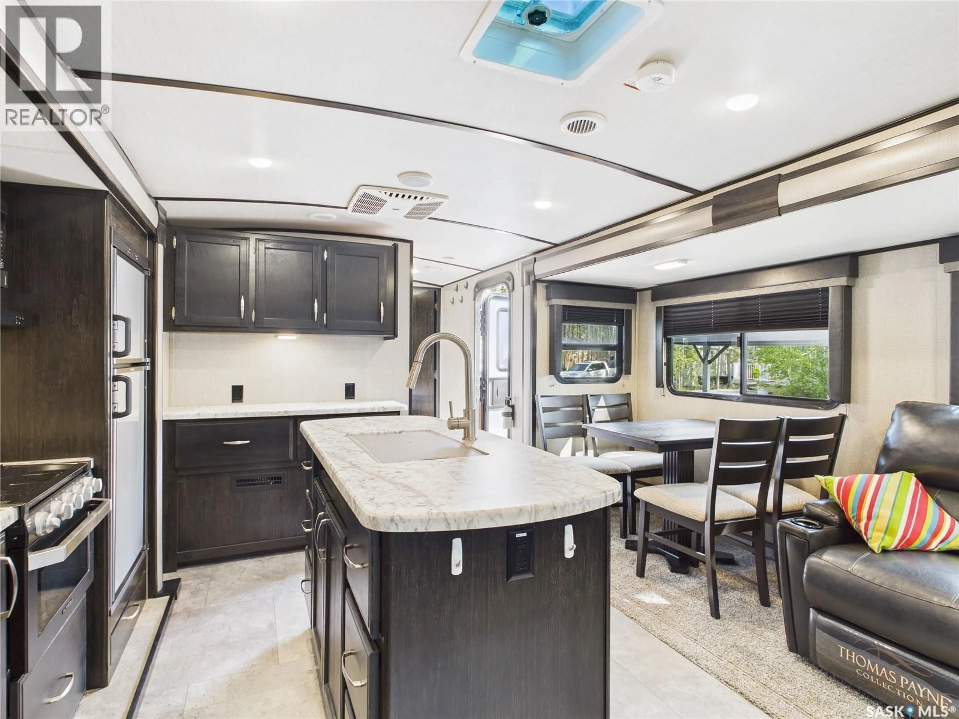 Open concept kitchen, ceramic/tile floor for 408 OWL STREET, Candle Lake Saskatchewan S0J3E0