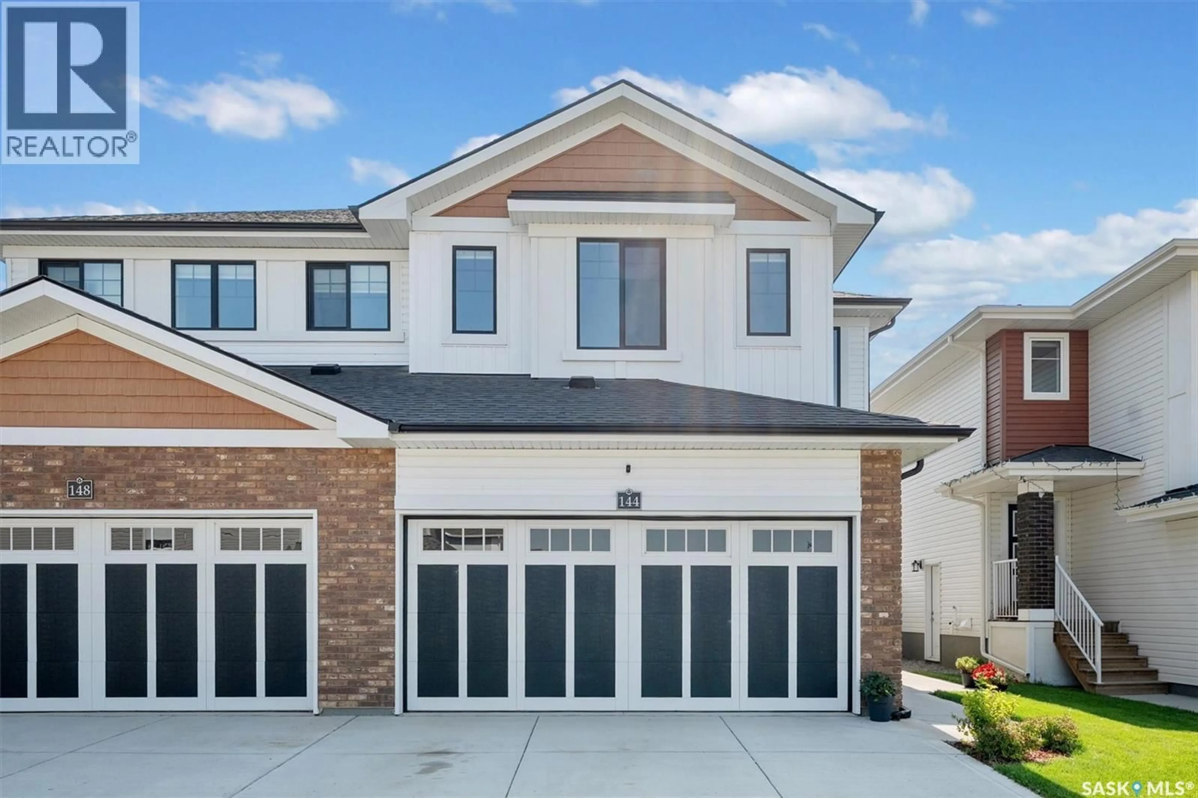 Home with vinyl exterior material, street for 144 TUFTS WAY, Saskatoon Saskatchewan S7V1P4