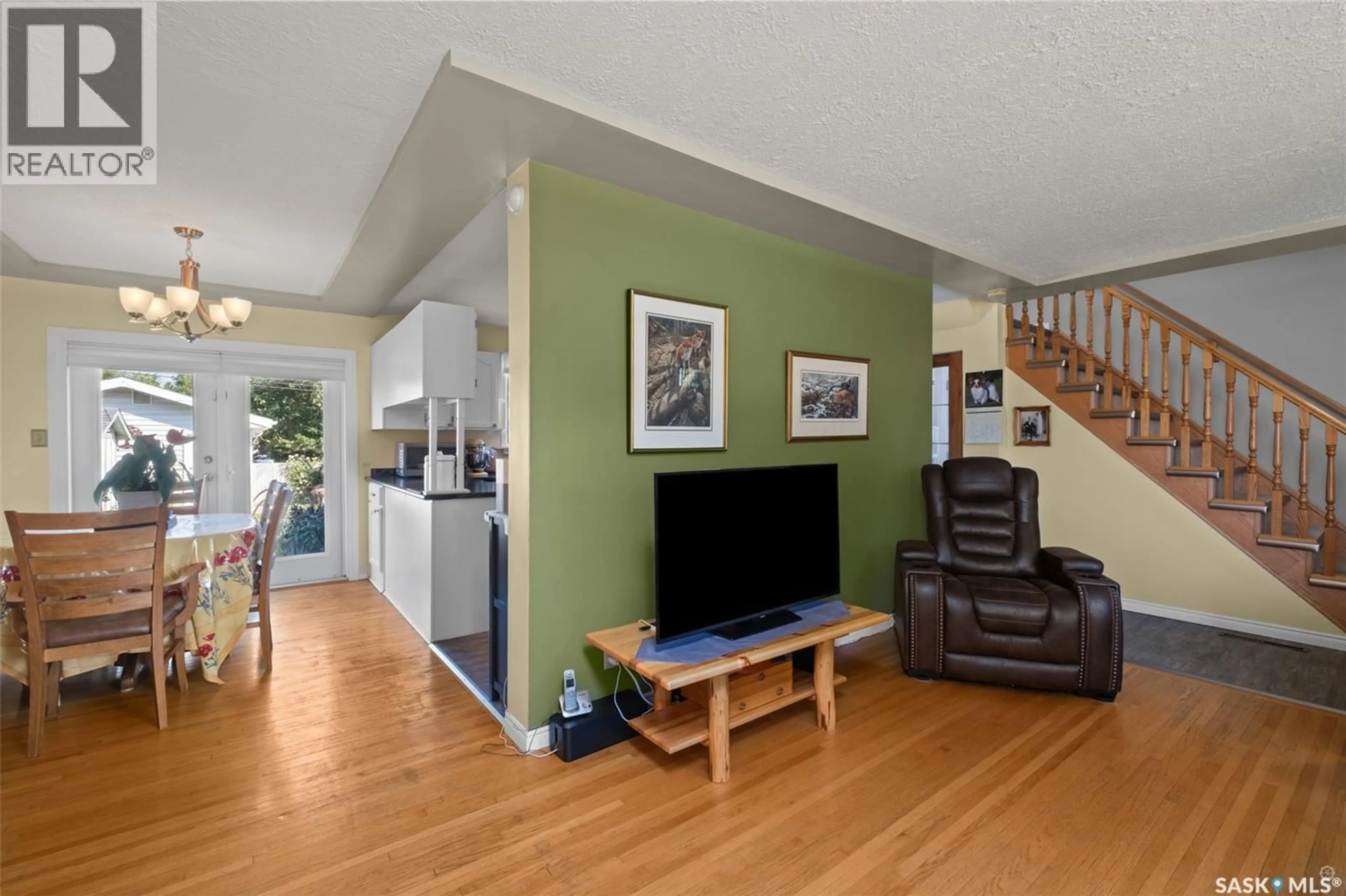 Living room with furniture, wood/laminate floor for 440 26TH STREET, Prince Albert Saskatchewan S6V1V2