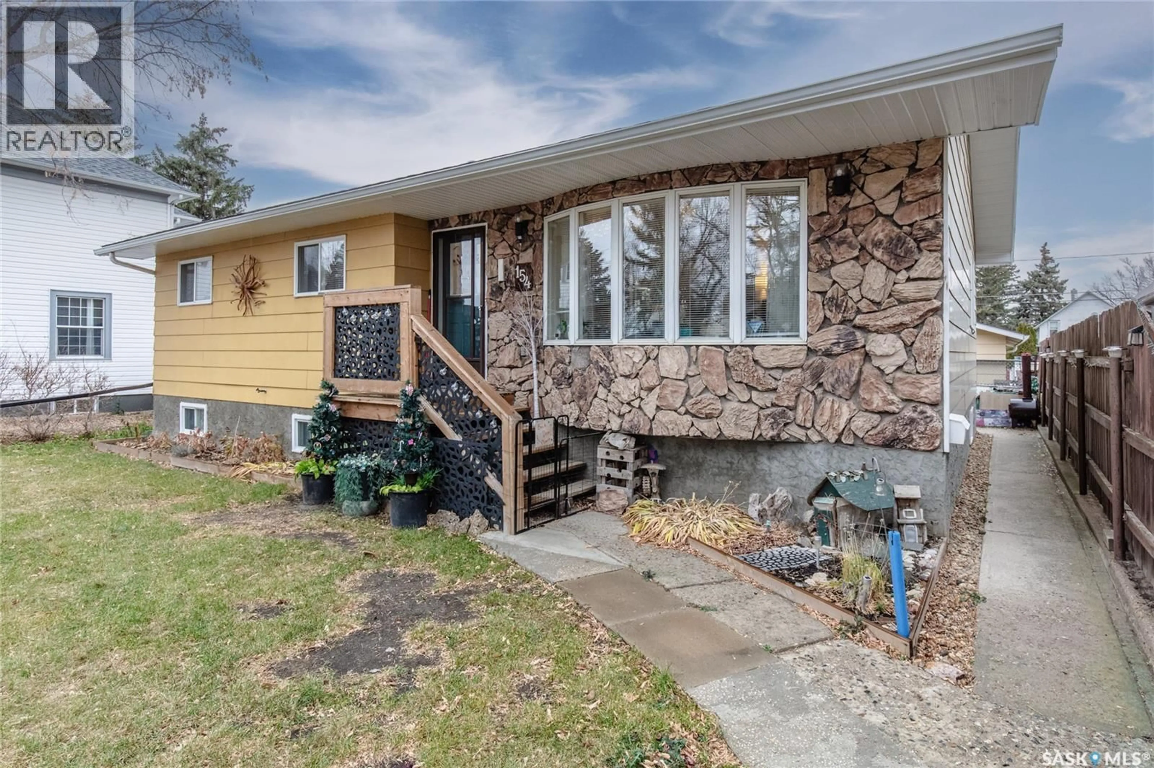 Home with brick exterior material, street for 154 COTEAU STREET, Moose Jaw Saskatchewan S6H5C5