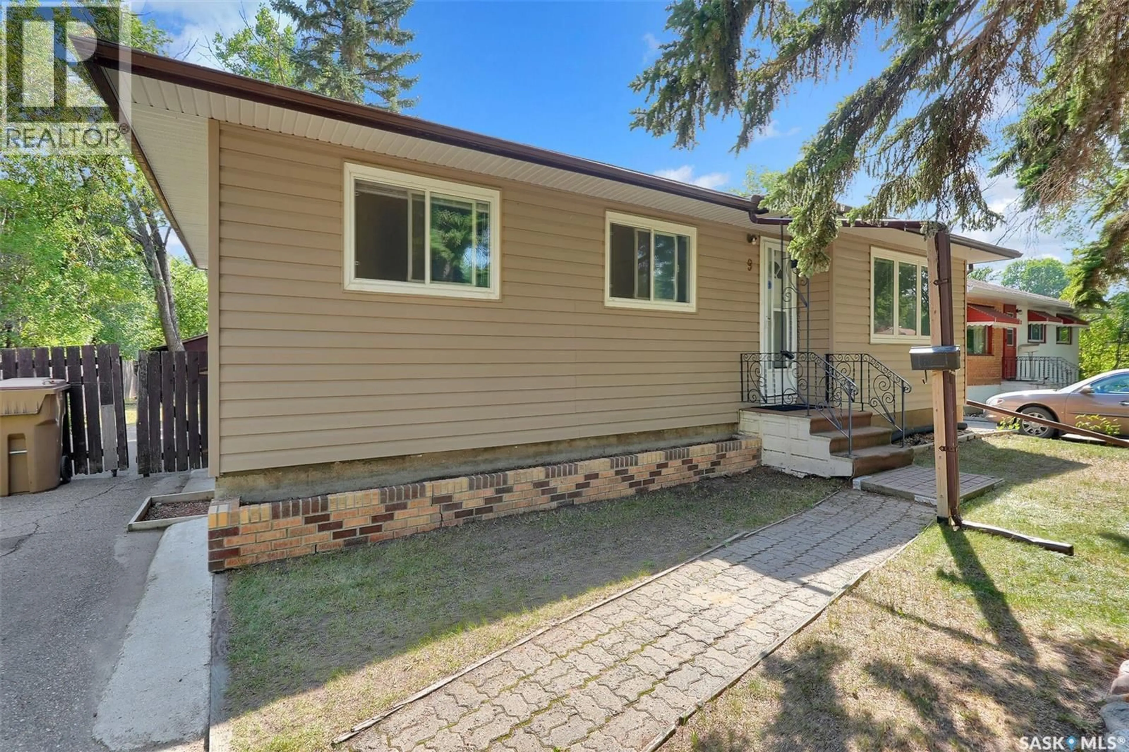Home with vinyl exterior material, street for 9 LAKE STREET, Regina Saskatchewan S4S4A7