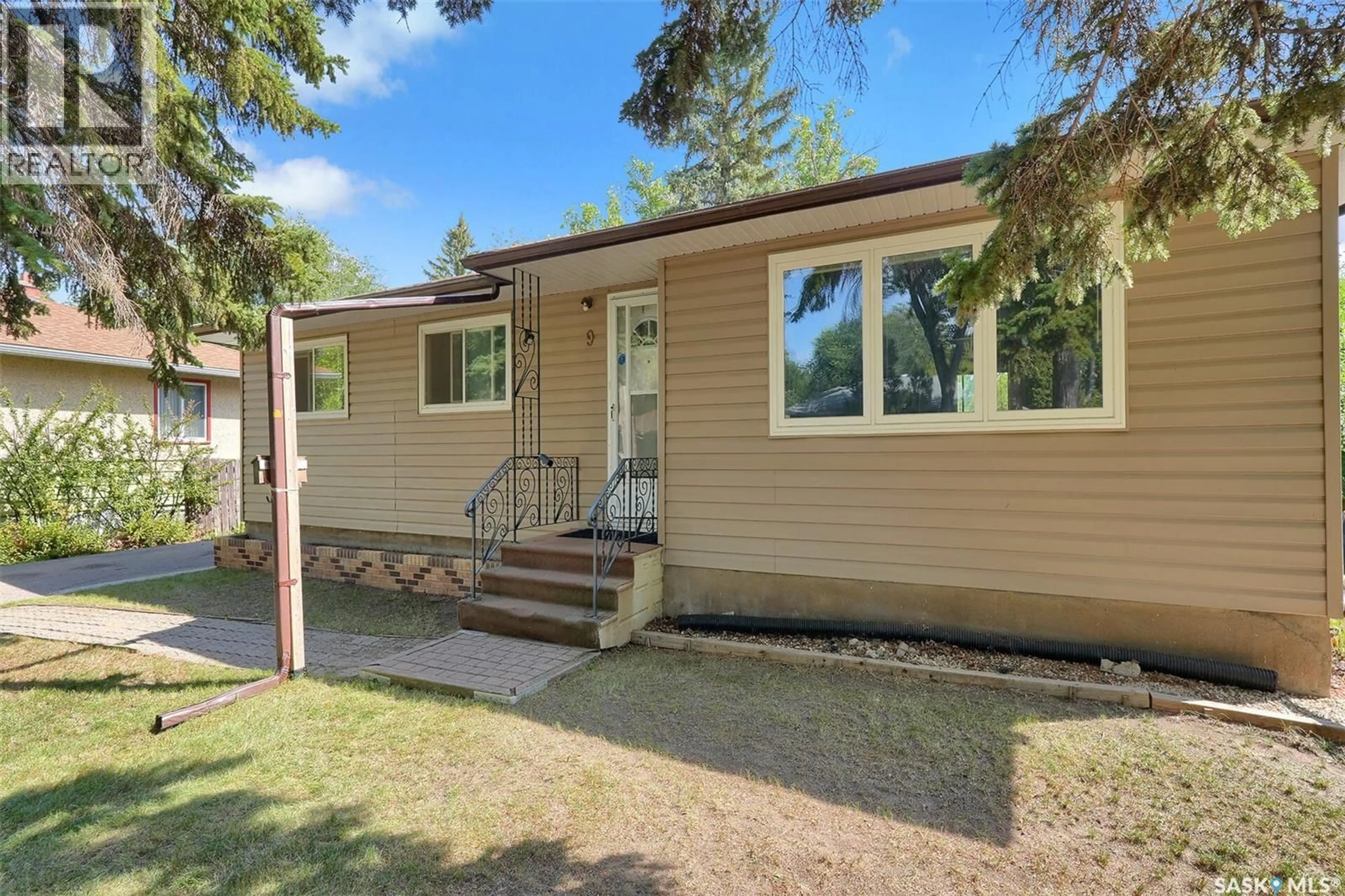 Home with vinyl exterior material, street for 9 LAKE STREET, Regina Saskatchewan S4S4A7
