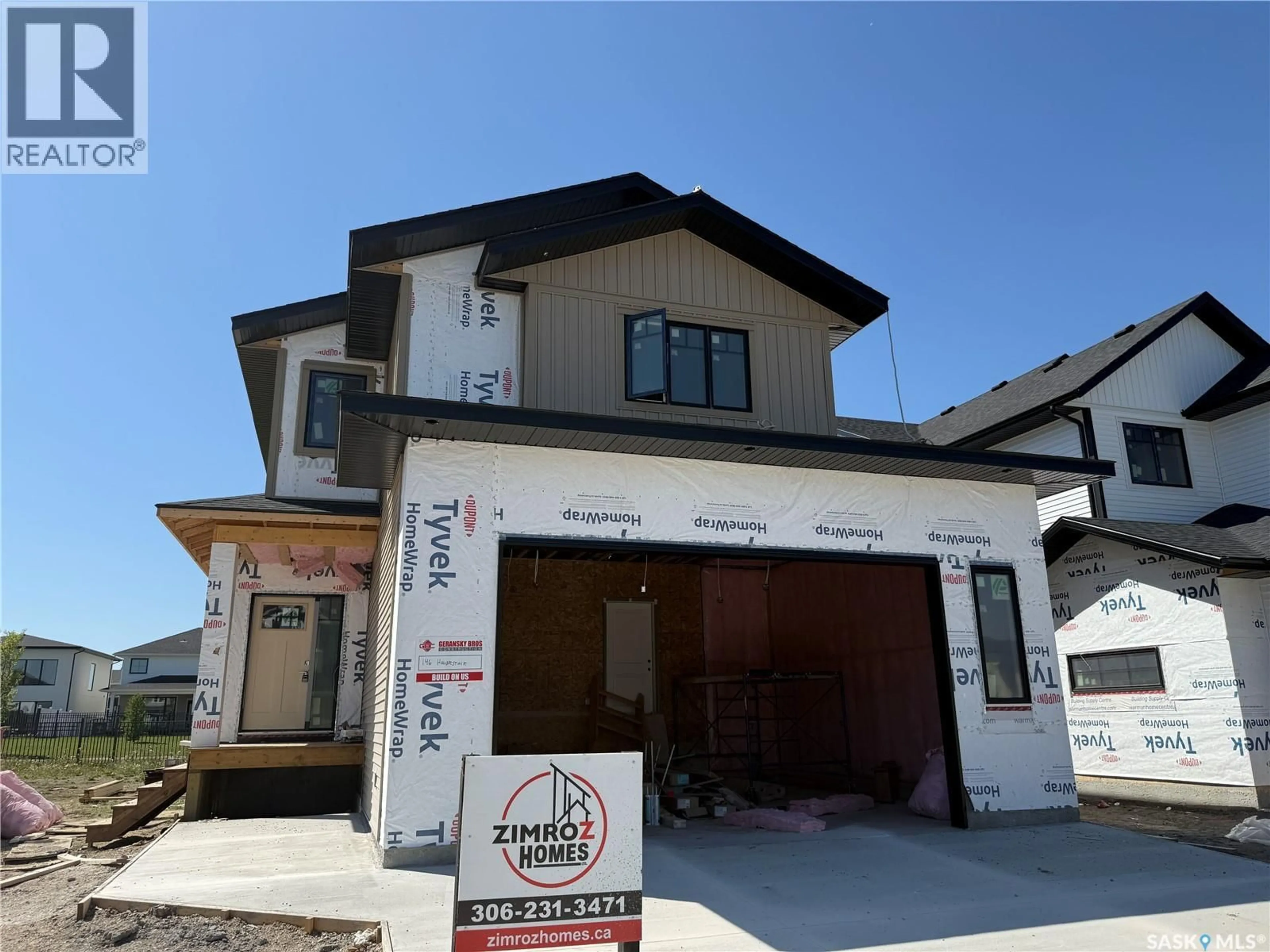 Home with vinyl exterior material, street for 146 HAVERSTOCK CRESCENT, Saskatoon Saskatchewan S7W1E2