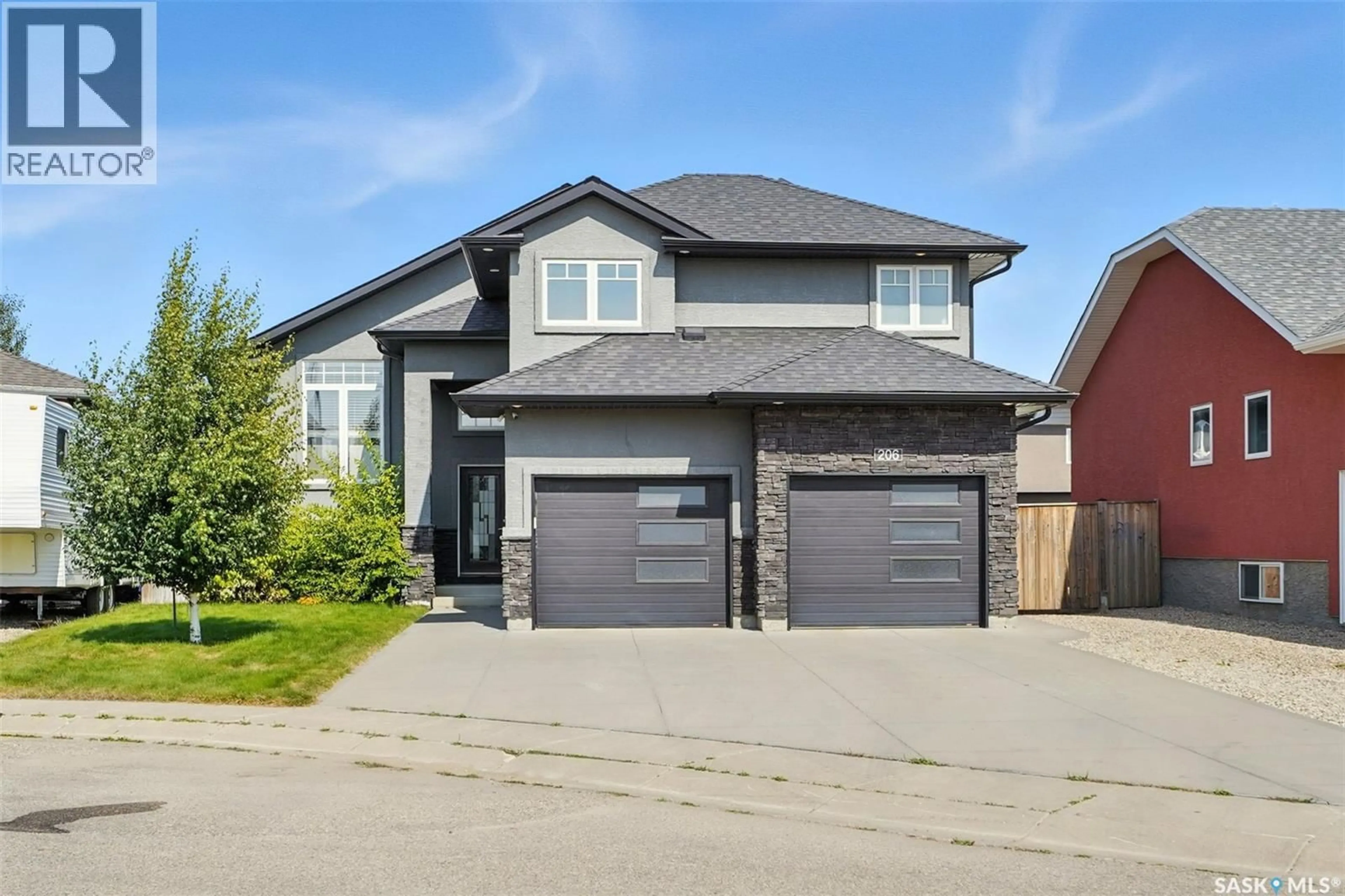 Home with brick exterior material, street for 206 ROY TERRACE, Saskatoon Saskatchewan S7W0L1