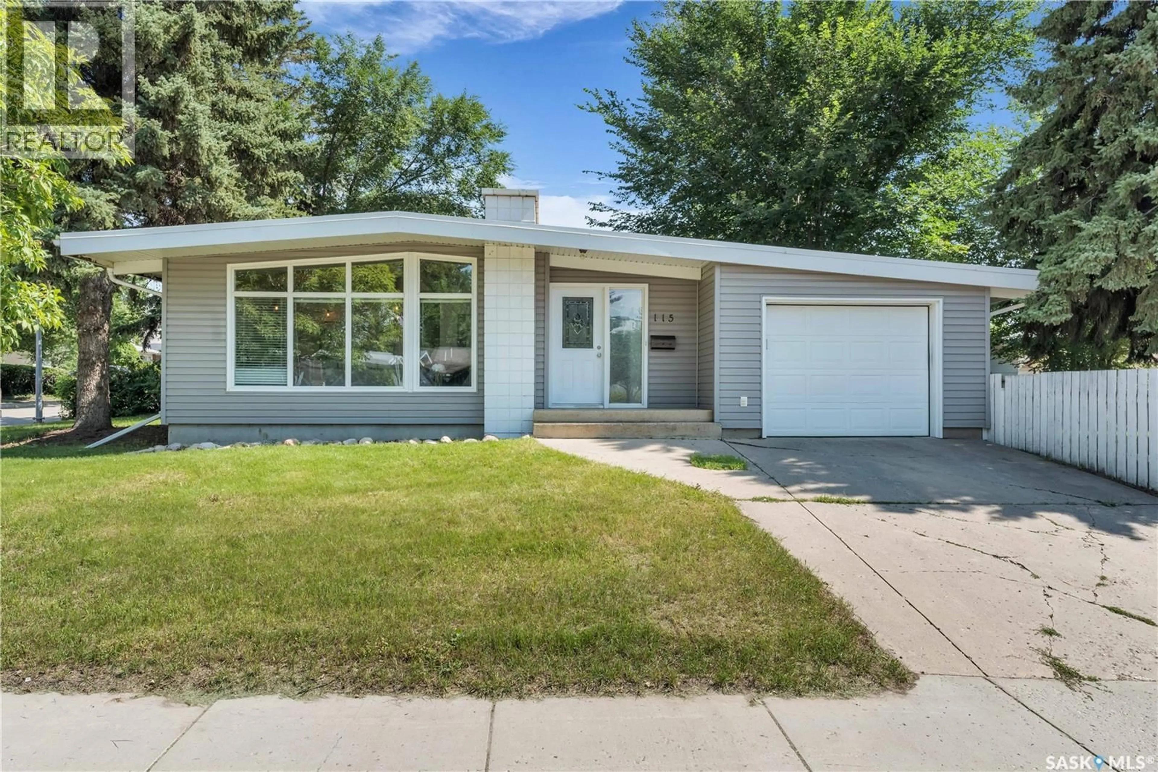 Home with vinyl exterior material, street for 115 BALDWIN CRESCENT, Saskatoon Saskatchewan S7H3M5