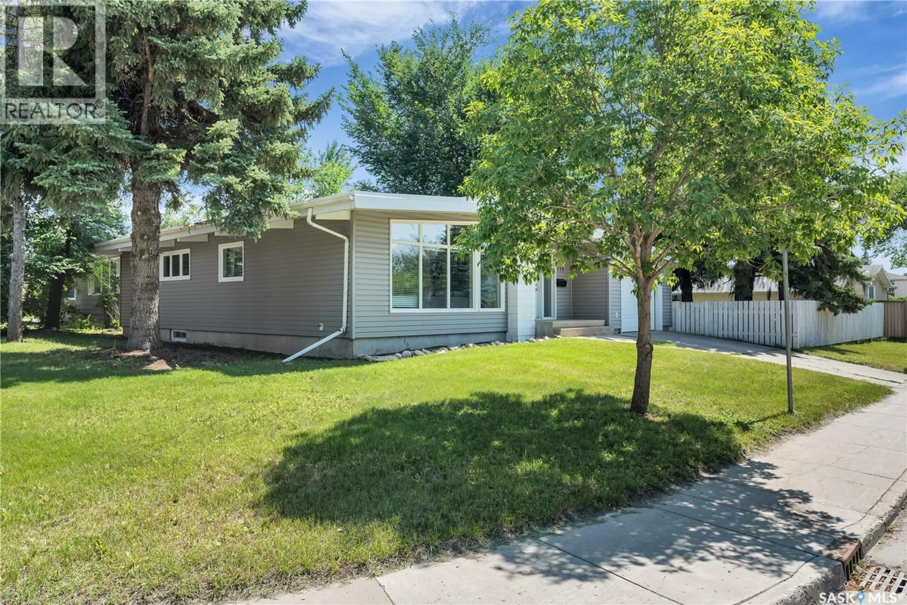 Home with vinyl exterior material, street for 115 BALDWIN CRESCENT, Saskatoon Saskatchewan S7H3M5