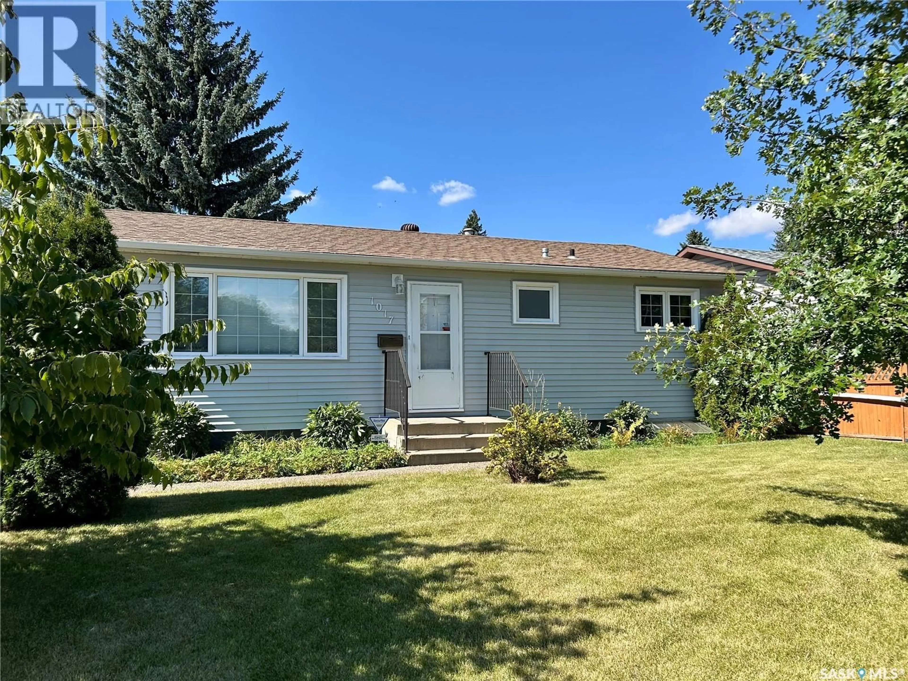 Home with vinyl exterior material, street for 1017 MATHESON DRIVE, Saskatoon Saskatchewan S7K3Y9