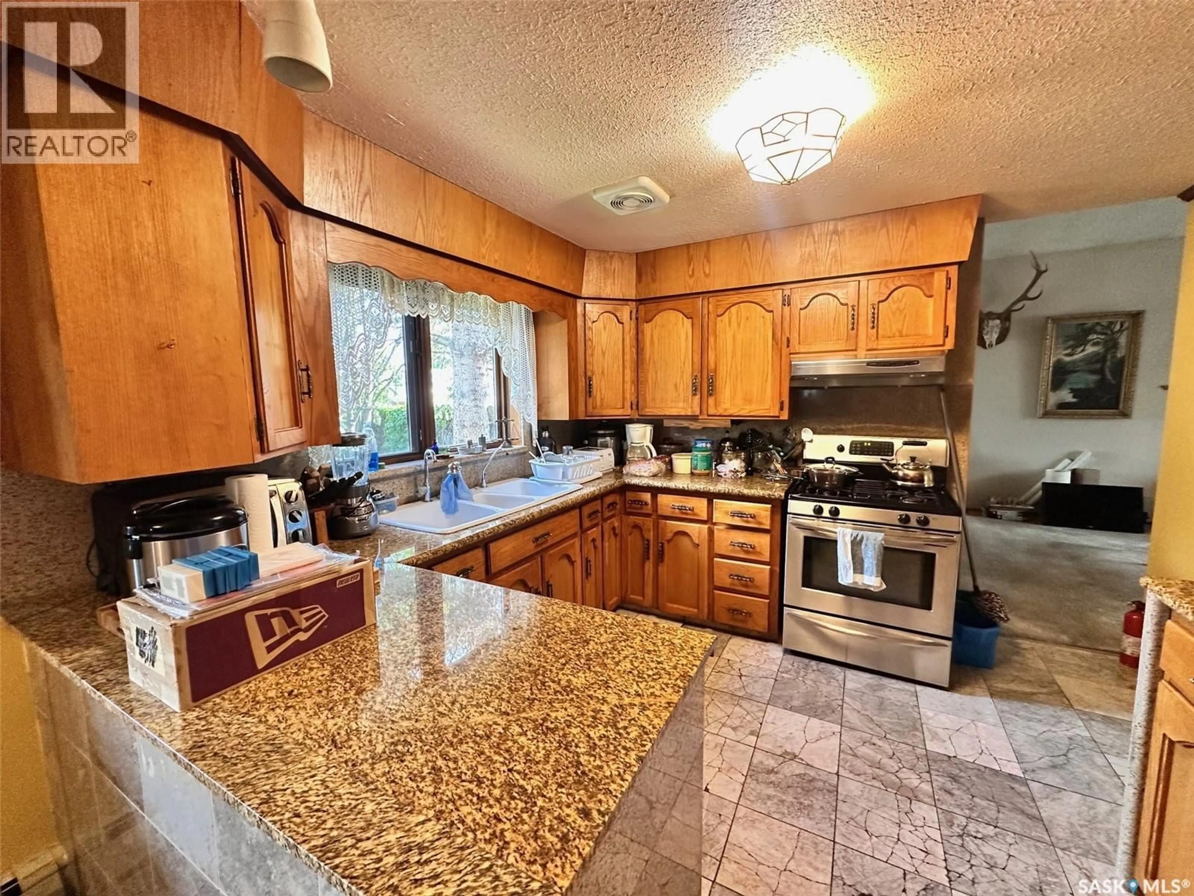 Standard kitchen, ceramic/tile floor for 209 5TH AVENUE, Spiritwood Saskatchewan S0J2M0