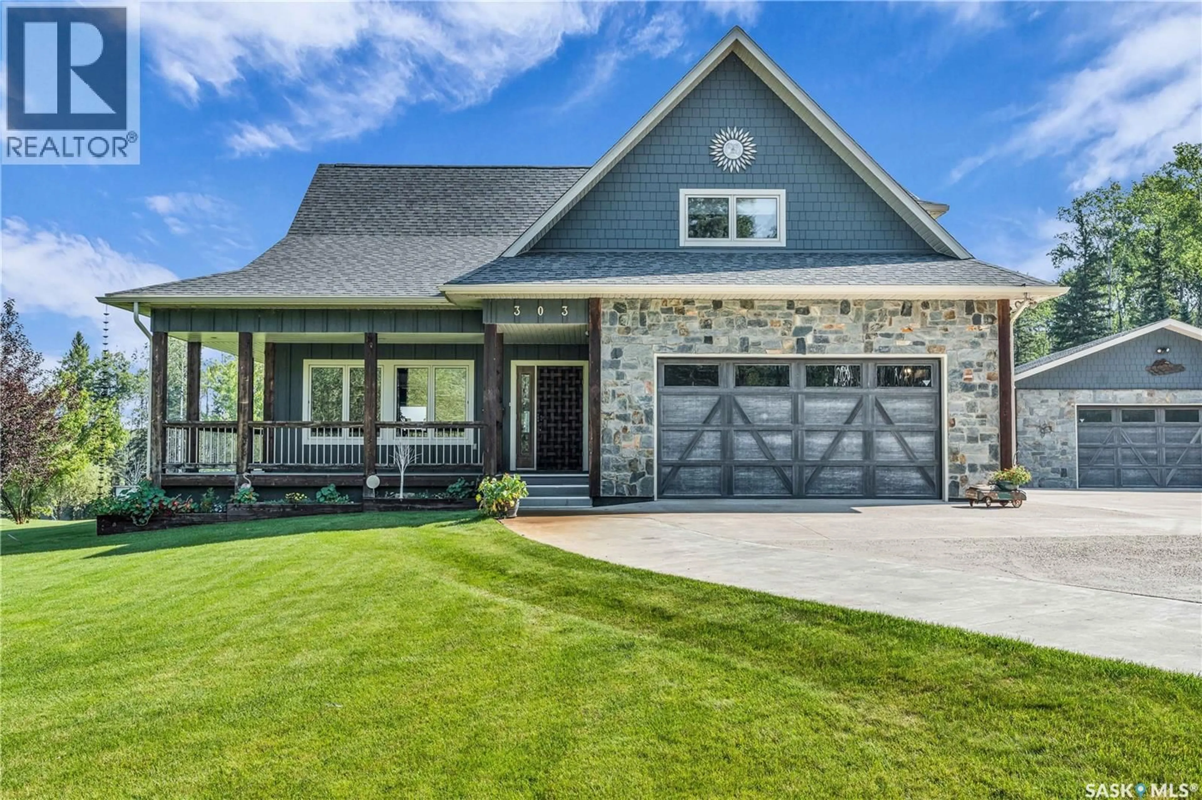 Home with brick exterior material, street for 303 MEADOW RIDGE DRIVE, Candle Lake Saskatchewan S0J3E0