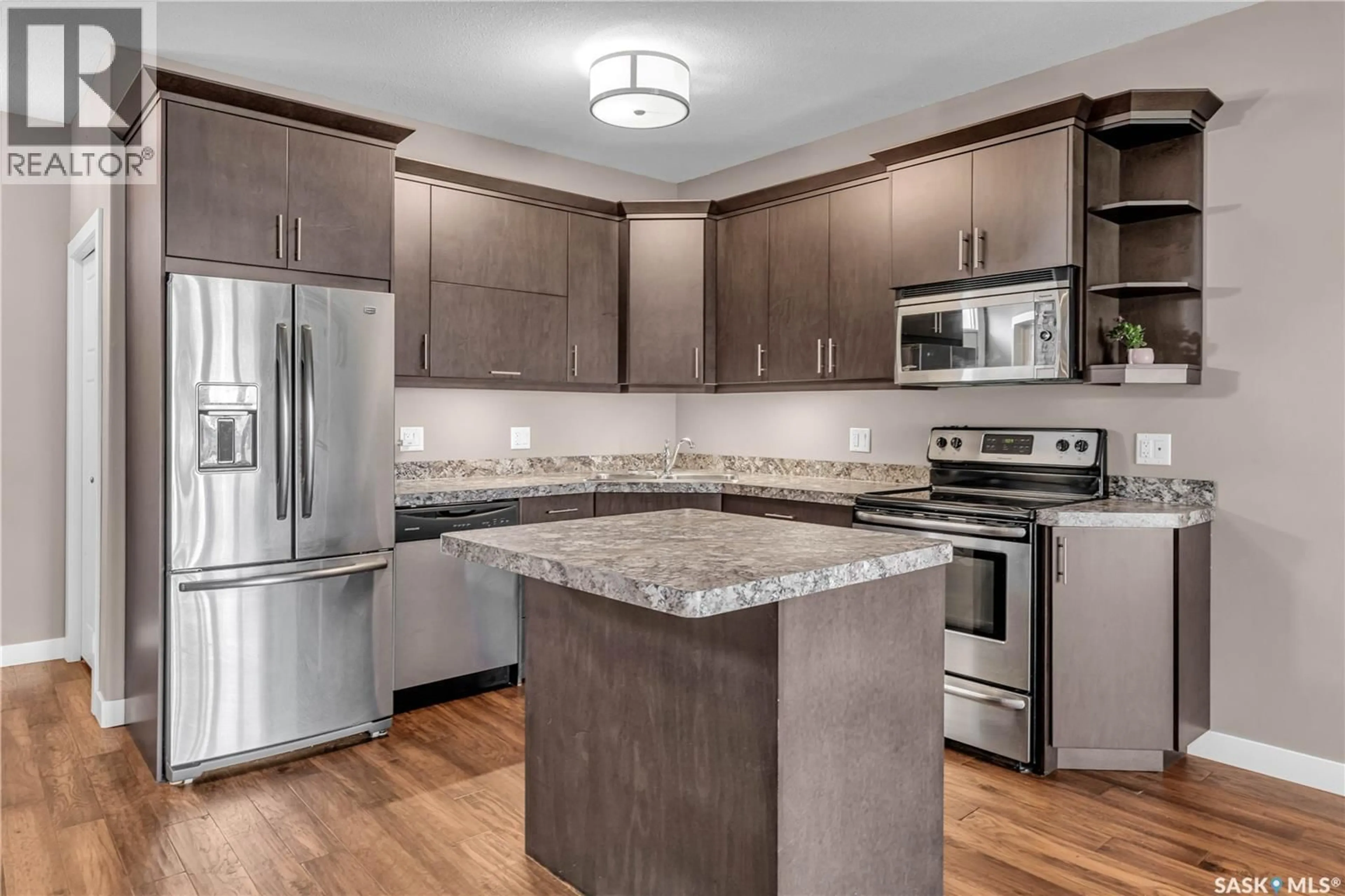 Open concept kitchen, unknown for 4228 GREEN APPLE DRIVE, Regina Saskatchewan S4V1S1