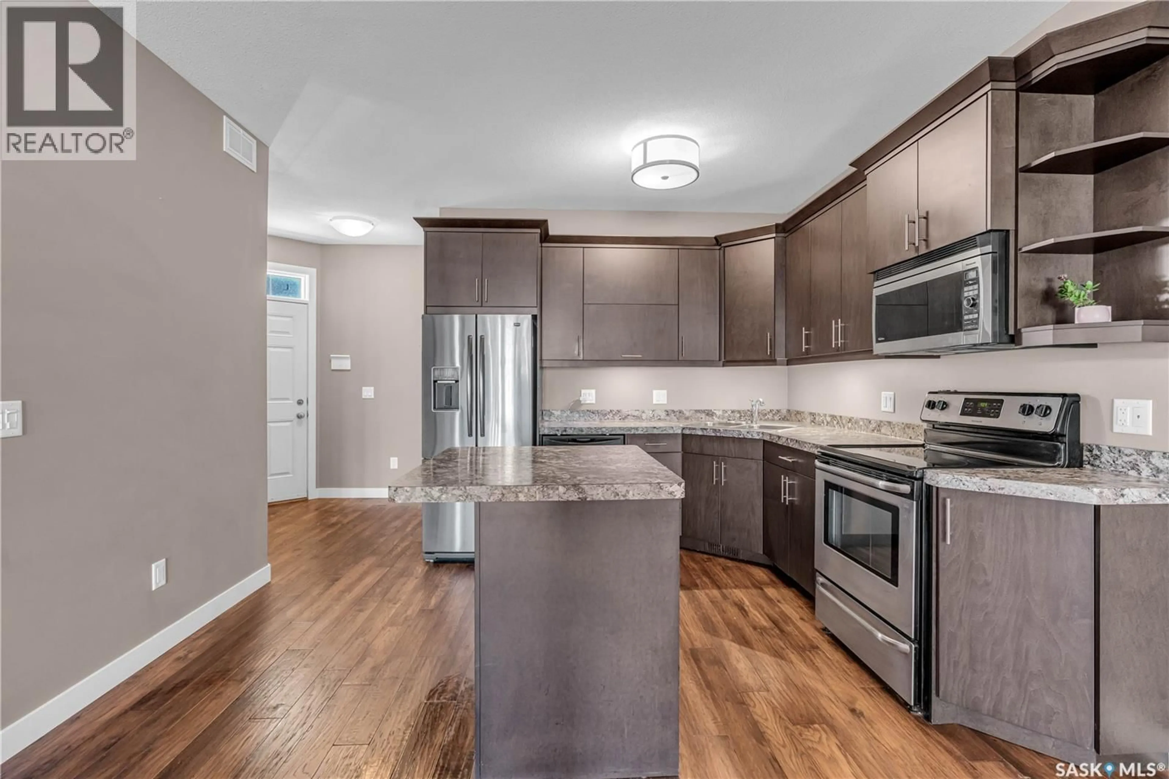 Open concept kitchen, unknown for 4228 GREEN APPLE DRIVE, Regina Saskatchewan S4V1S1