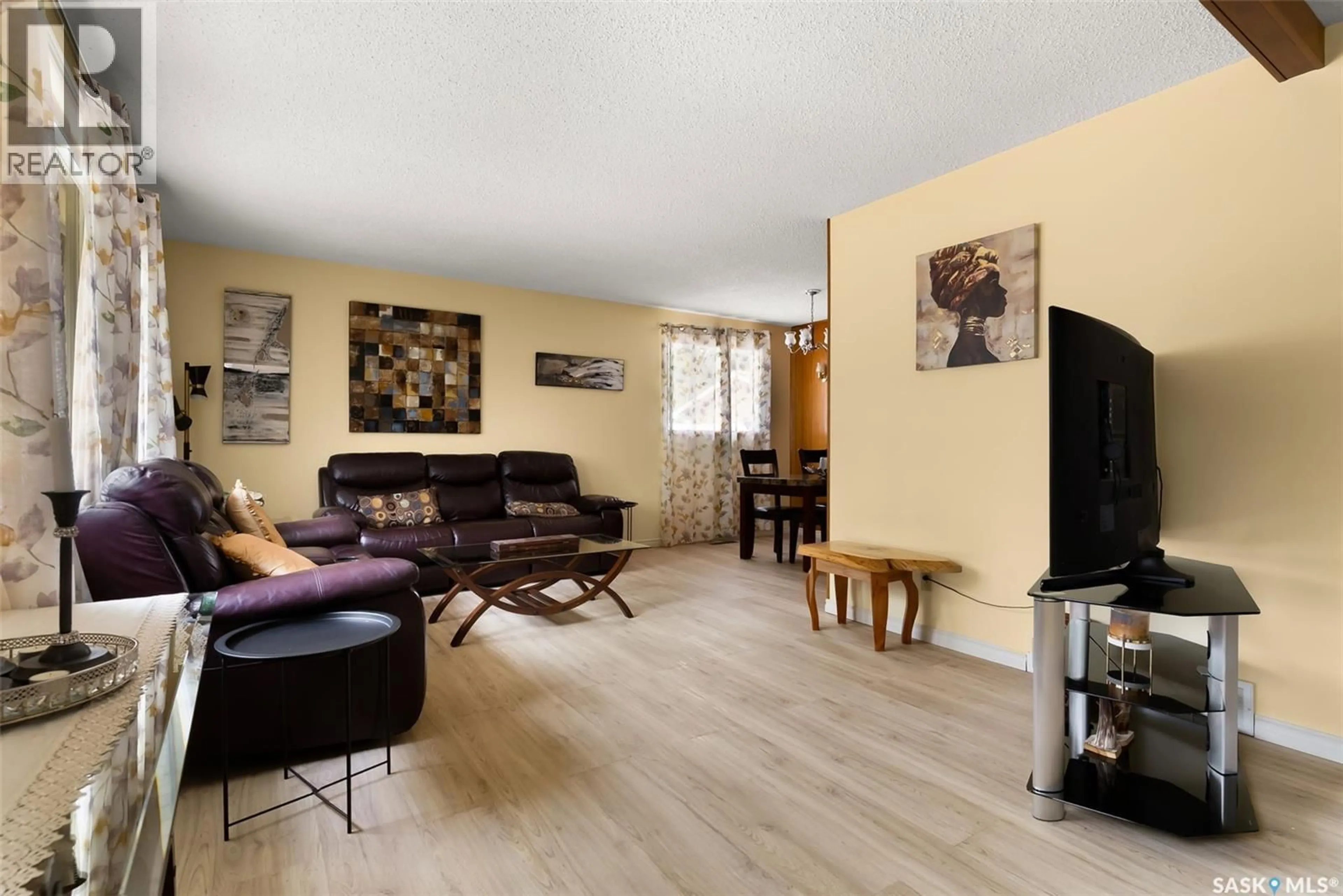 Living room with furniture, wood/laminate floor for 45 DROPE STREET, Regina Saskatchewan S4R4R7