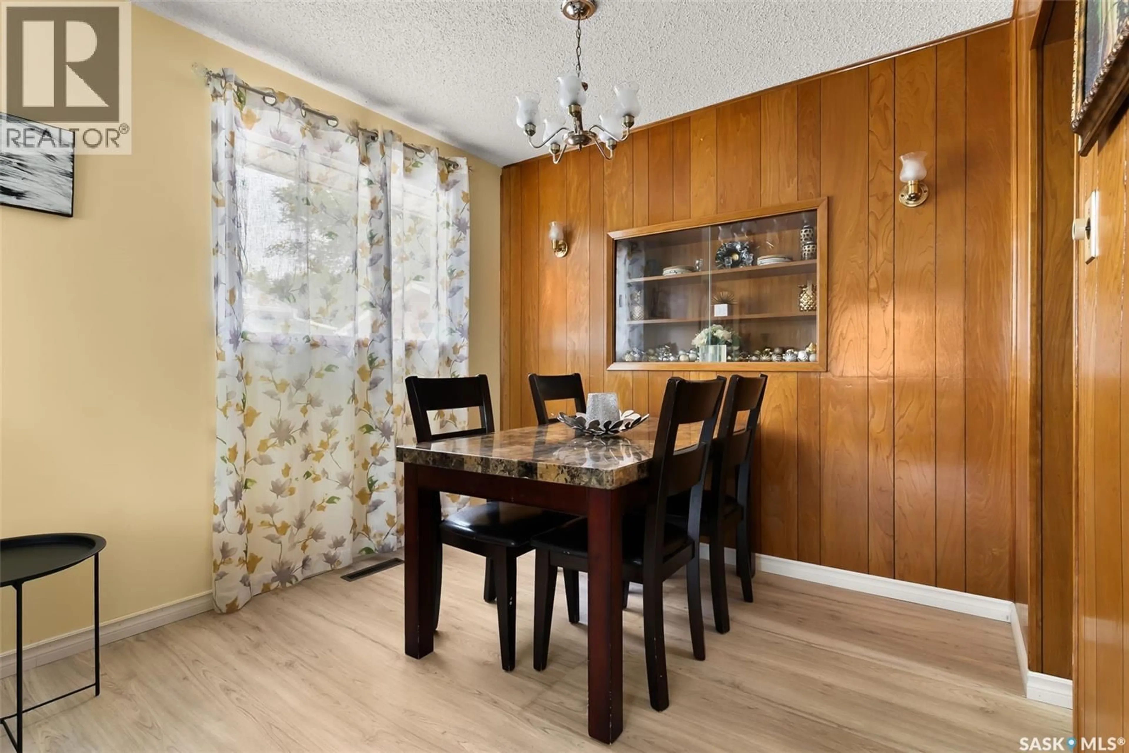 Dining room, wood/laminate floor for 45 DROPE STREET, Regina Saskatchewan S4R4R7