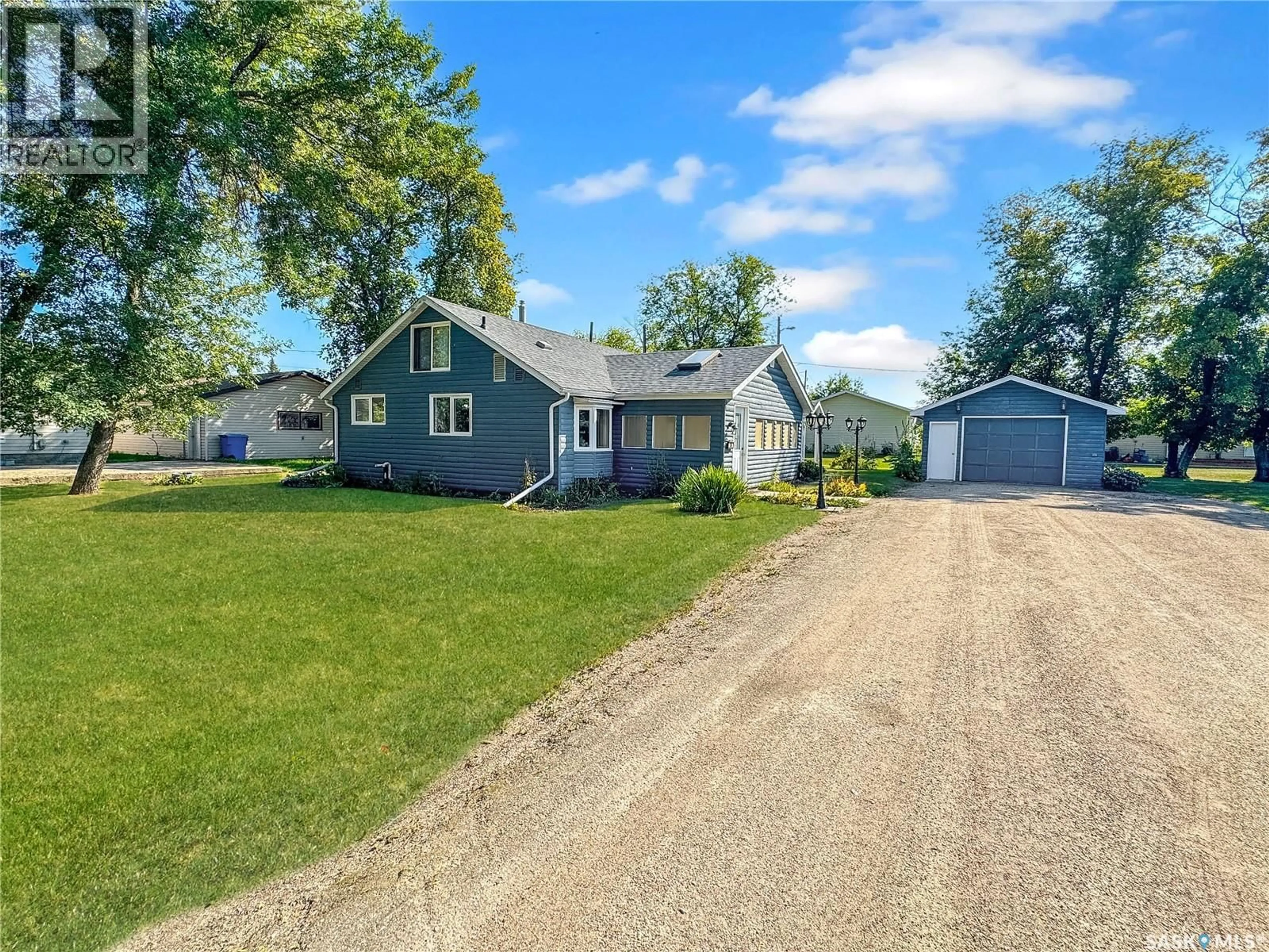 A pic from outside/outdoor area/front of a property/back of a property/a pic from drone, street for 308 2ND AVENUE, Leask Saskatchewan S0J1M0