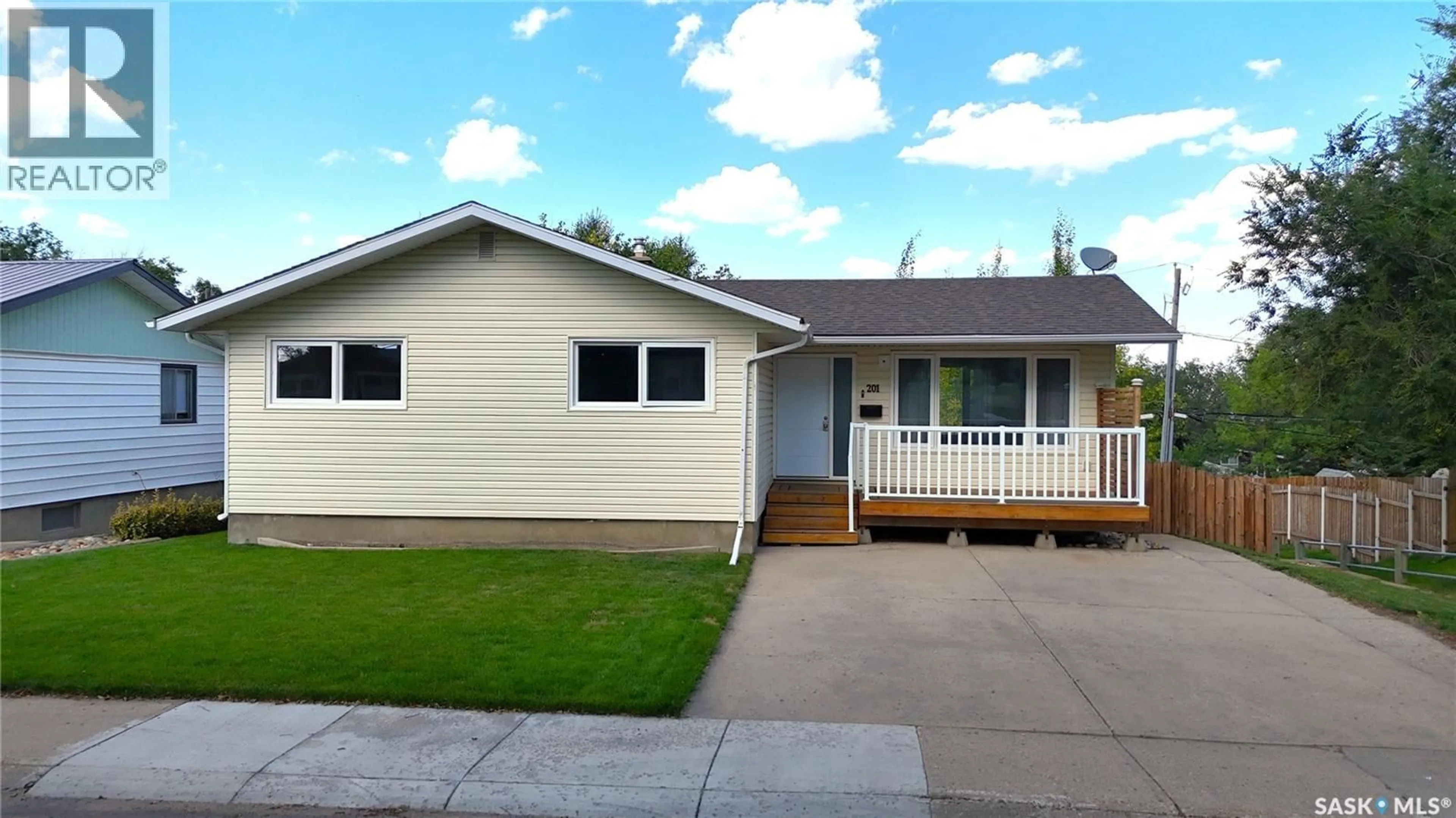 Home with vinyl exterior material, street for 201 CONLIN DRIVE, Swift Current Saskatchewan S9H3A9