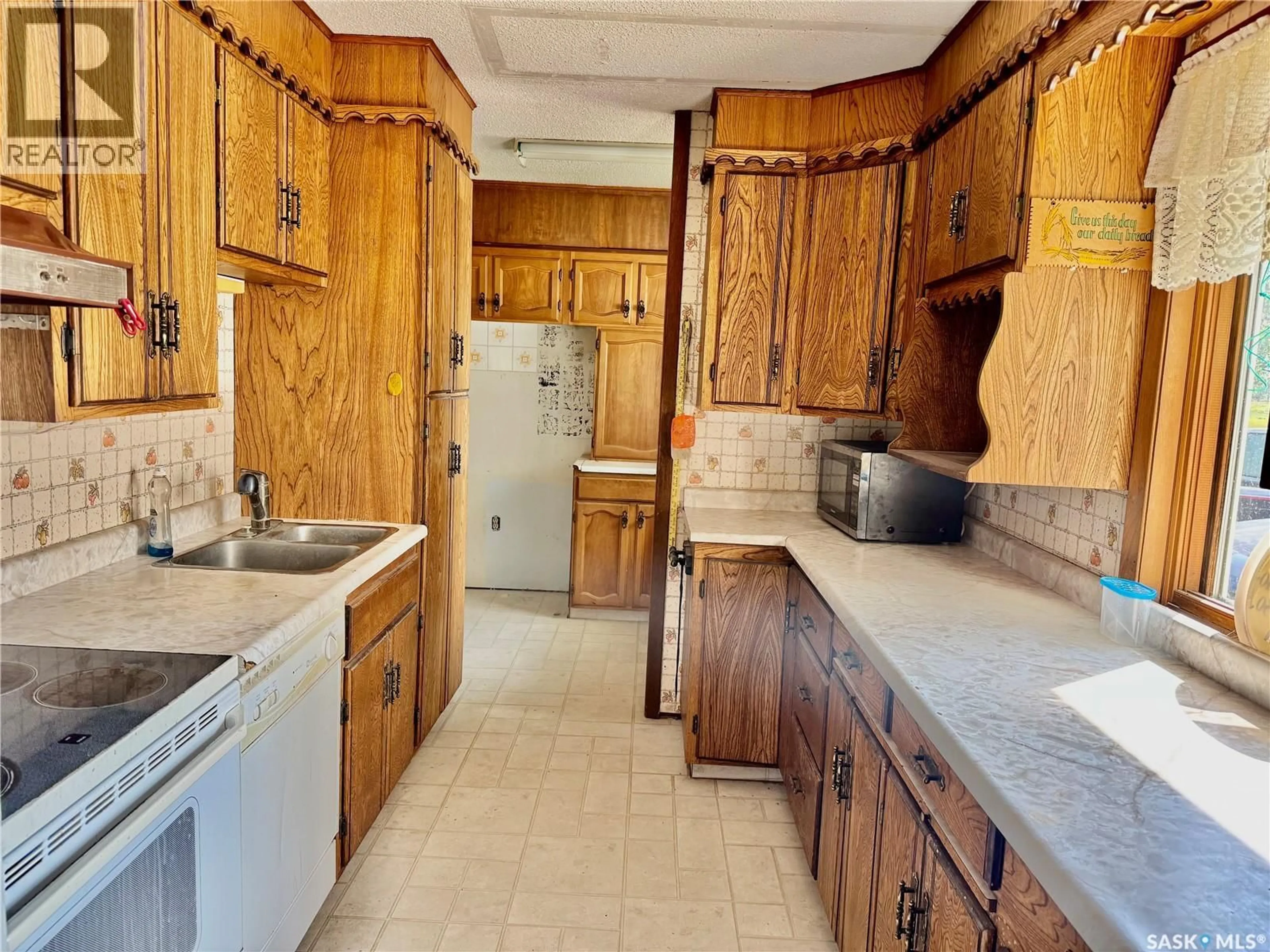 Standard kitchen, ceramic/tile floor for 332 NORREYS STREET, Drake Saskatchewan S0K1H0