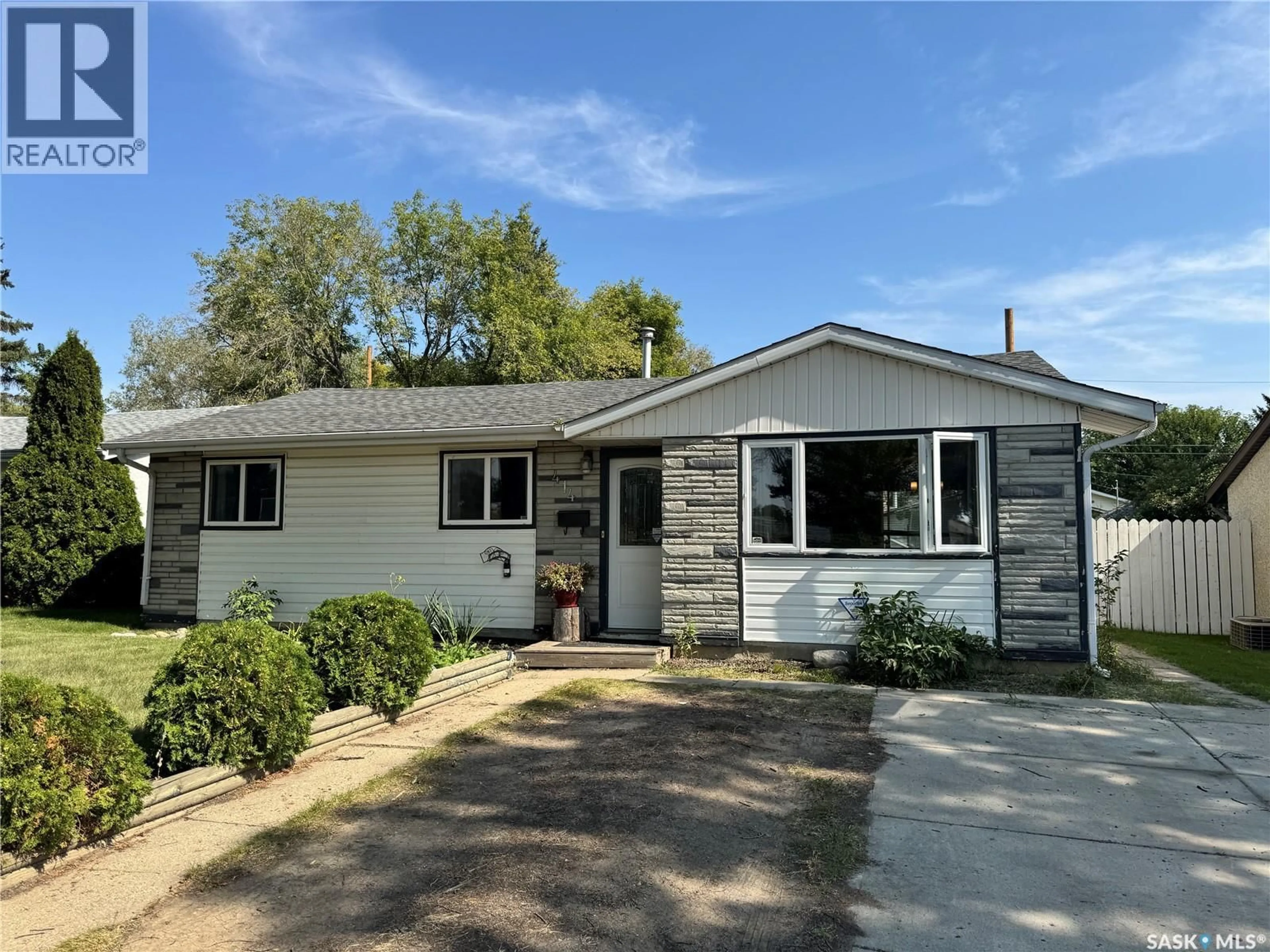 Home with vinyl exterior material, street for 414 WITNEY AVENUE, Saskatoon Saskatchewan S7L3M7
