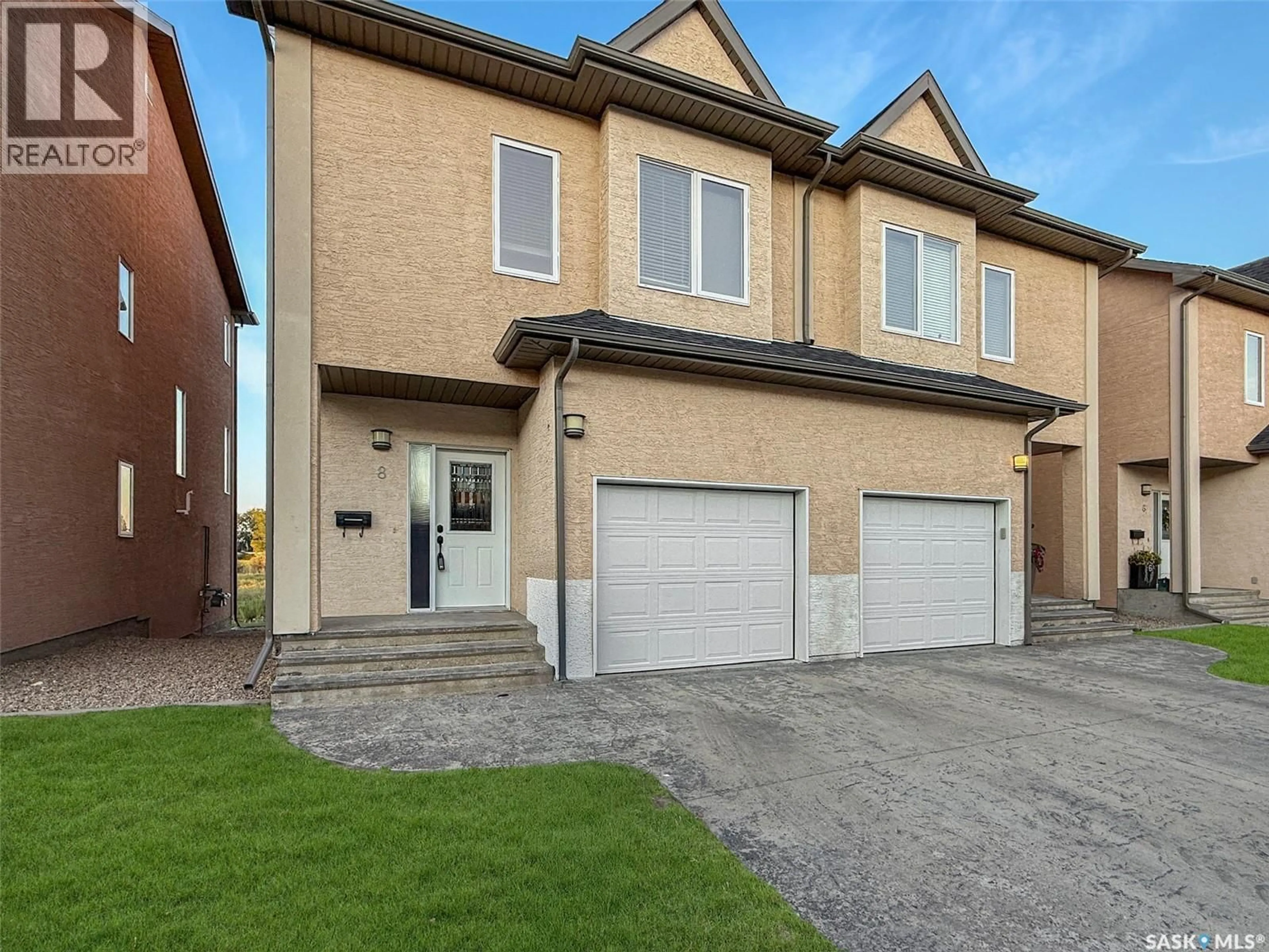 Home with brick exterior material, street for 8 701 MCINTOSH STREET E, Swift Current Saskatchewan S9H1H7