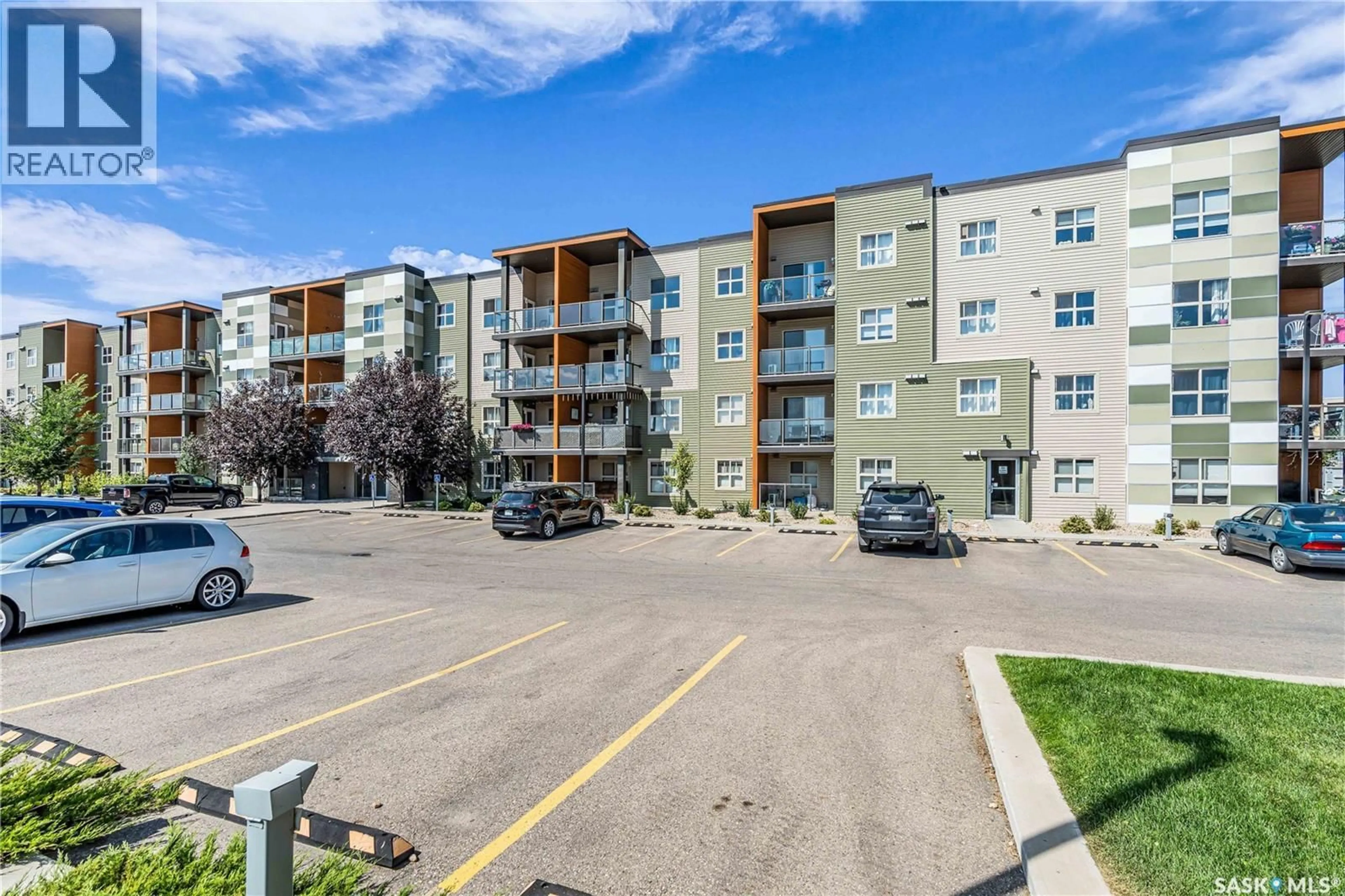 A pic from outside/outdoor area/front of a property/back of a property/a pic from drone, street for 5500 - 2206 MITCHINSON WAY, Regina Saskatchewan S4W0N9