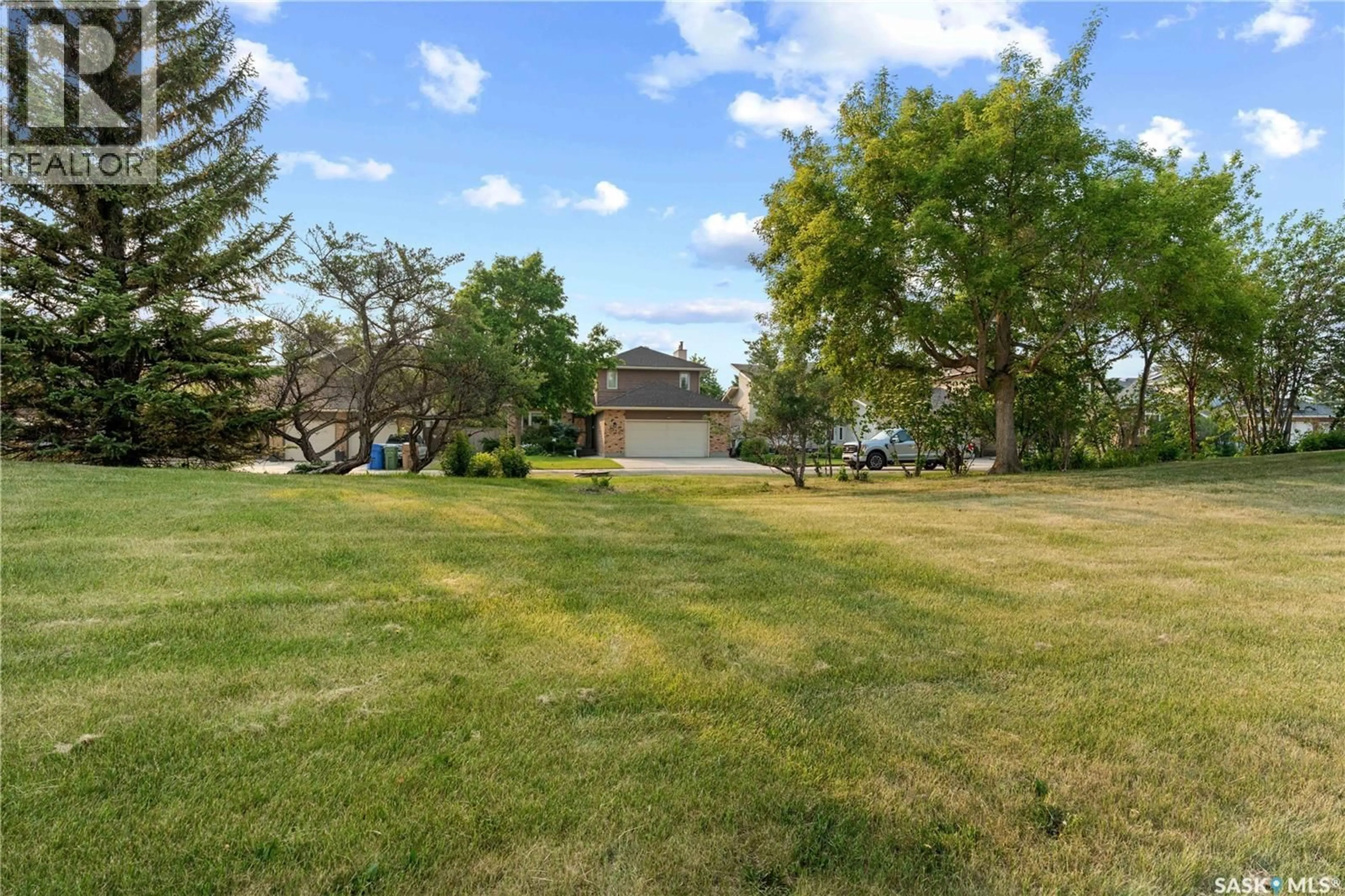 A pic from outside/outdoor area/front of a property/back of a property/a pic from drone, water/lake/river/ocean view for 1430 WASCANA HIGHLANDS, Regina Saskatchewan S4V2K2