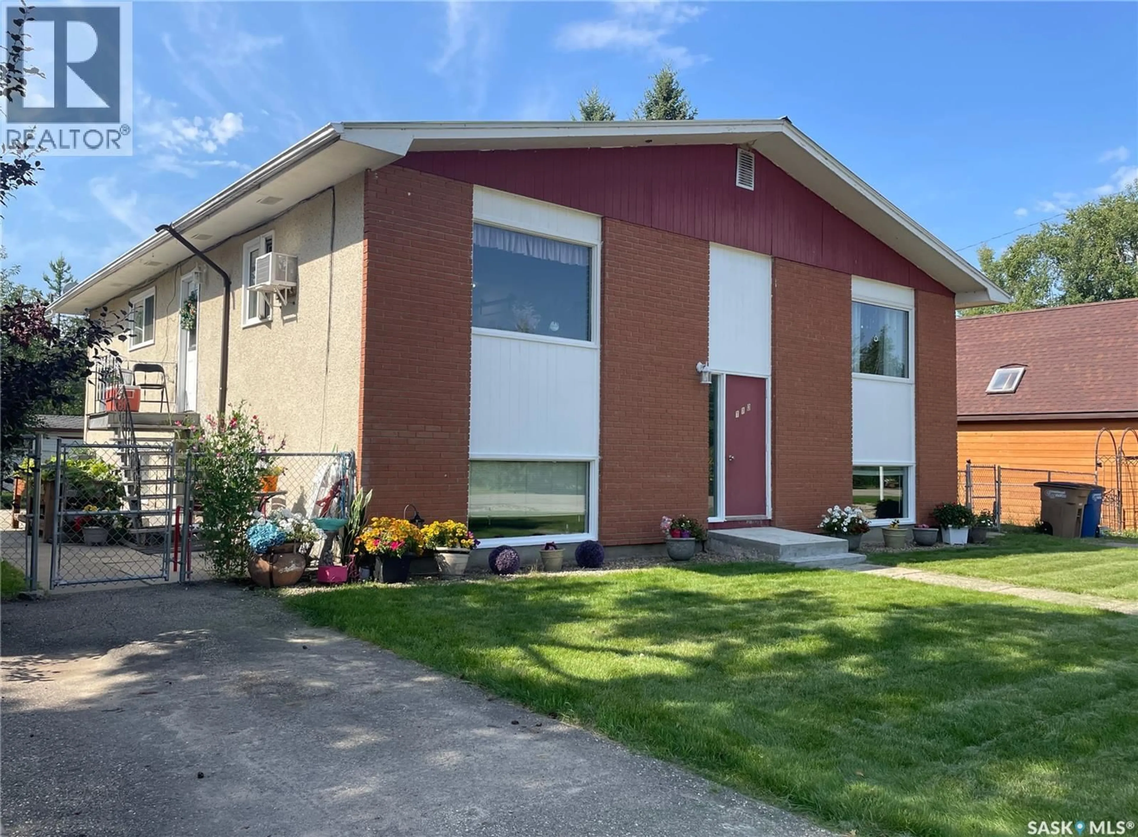 Home with vinyl exterior material, street for 110 7TH AVENUE, Big River Saskatchewan S0J0E0