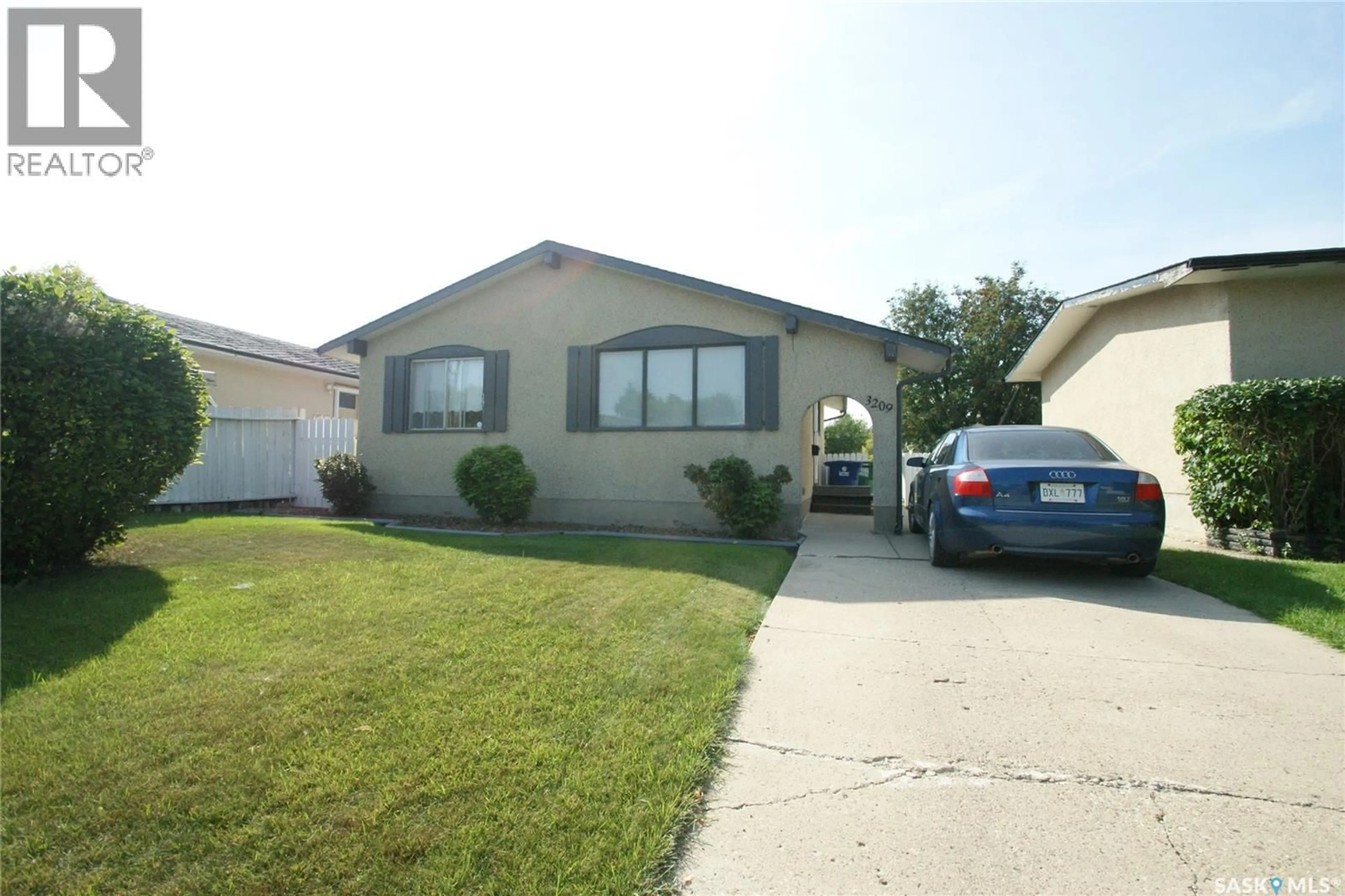 Home with vinyl exterior material, street for 3209 33RD STREET, Saskatoon Saskatchewan S7L4R1