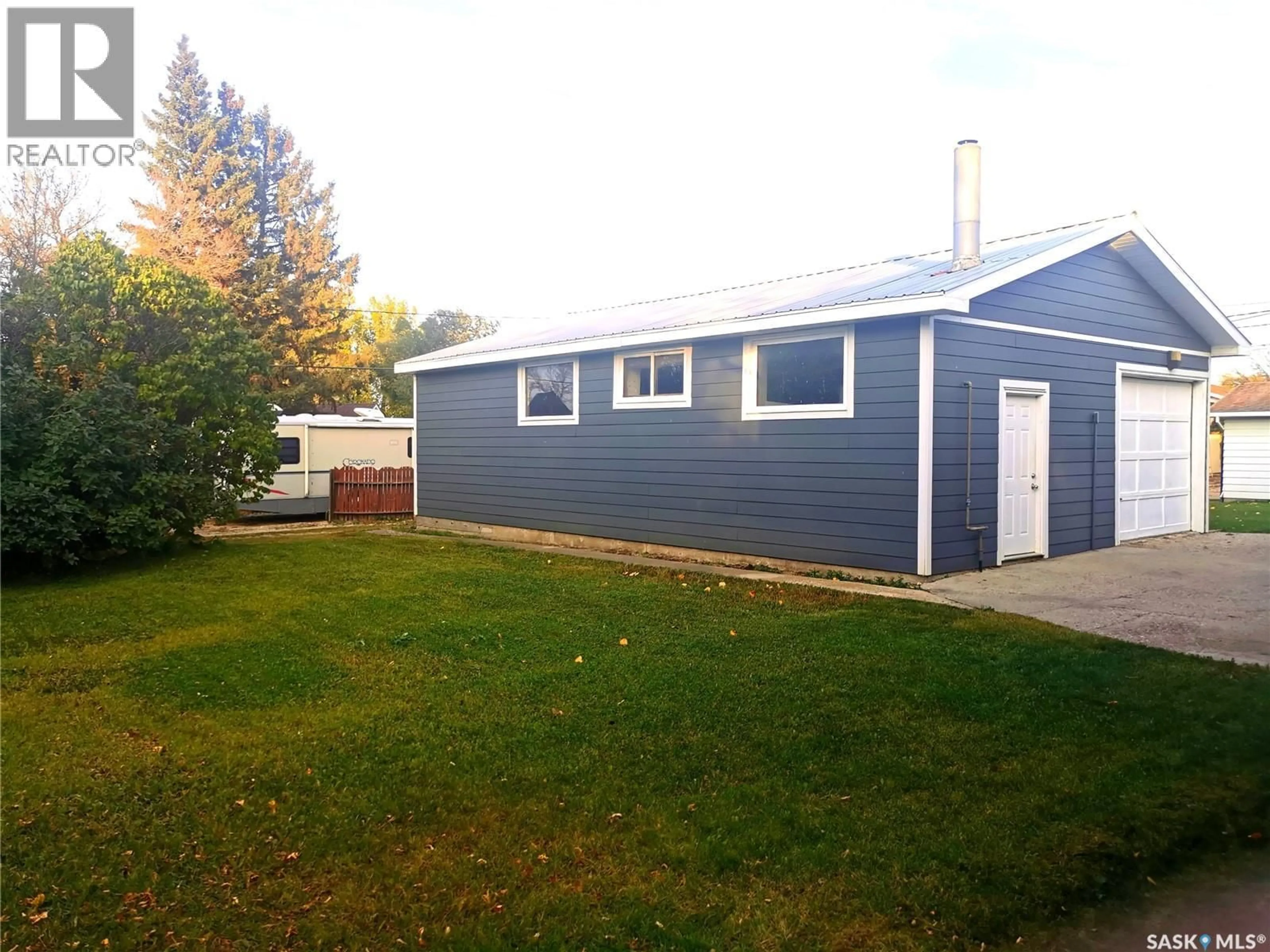 Home with vinyl exterior material, street for 609 KINTYRE AVENUE, Colonsay Saskatchewan S0K0Z0