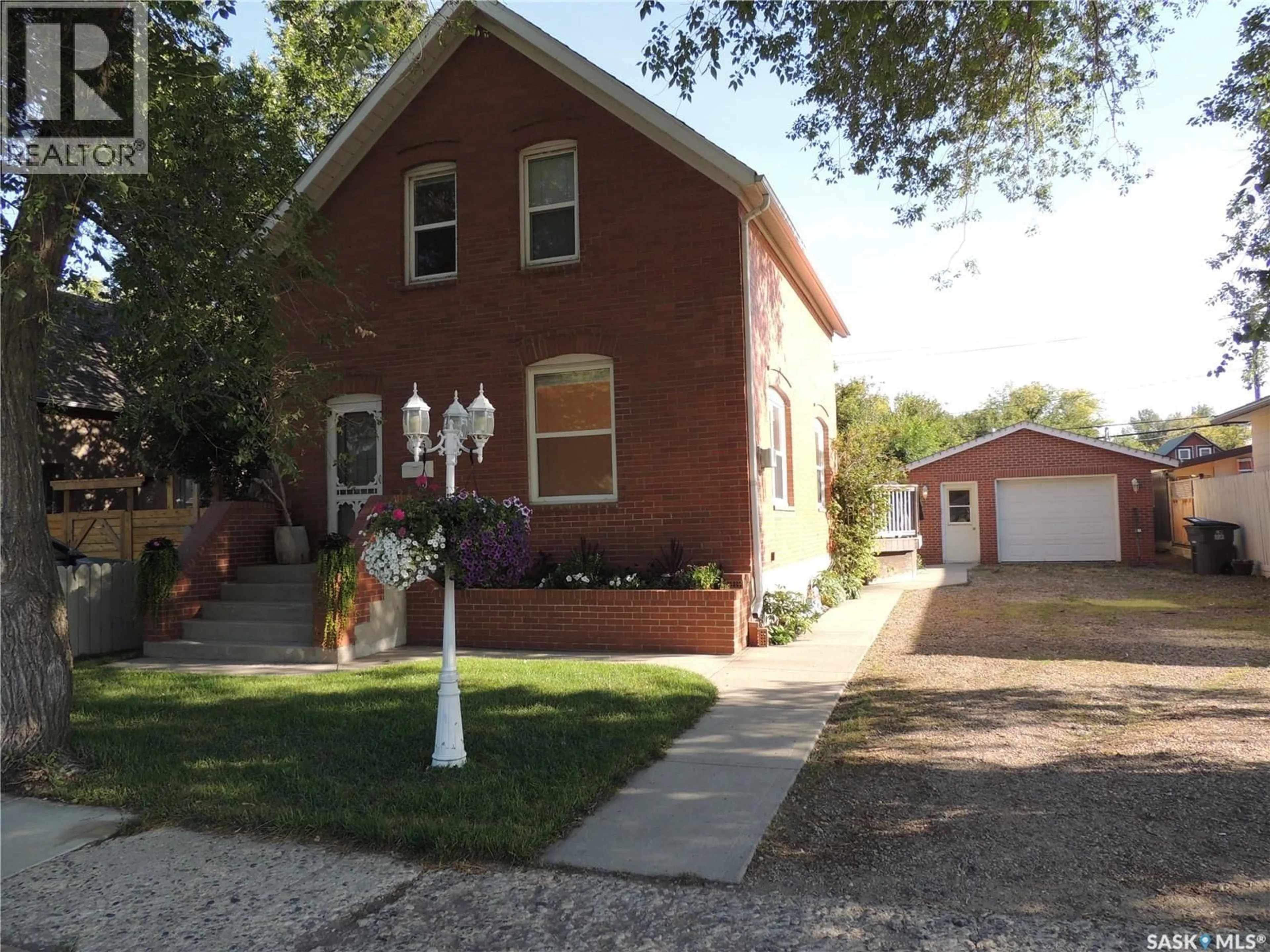 Home with brick exterior material, street for 1525 3RD STREET, Estevan Saskatchewan S4A0S5