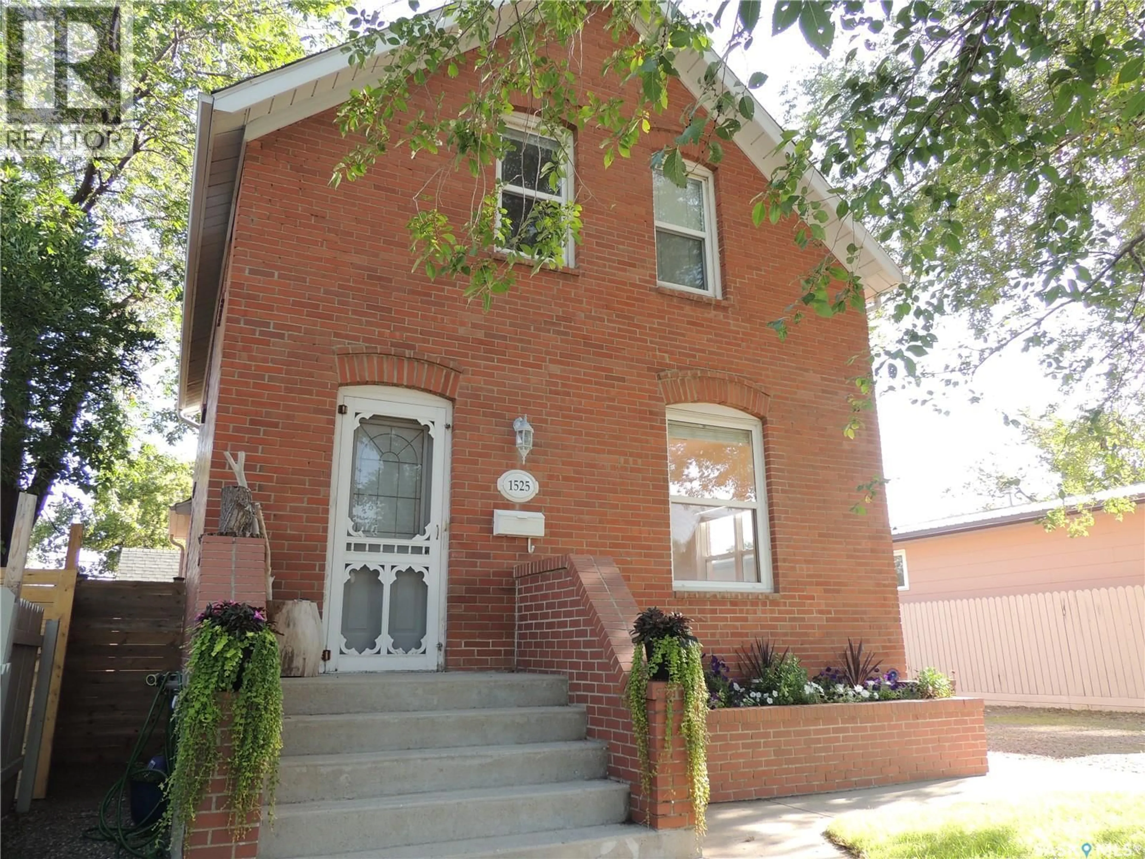 Home with brick exterior material, street for 1525 3RD STREET, Estevan Saskatchewan S4A0S5