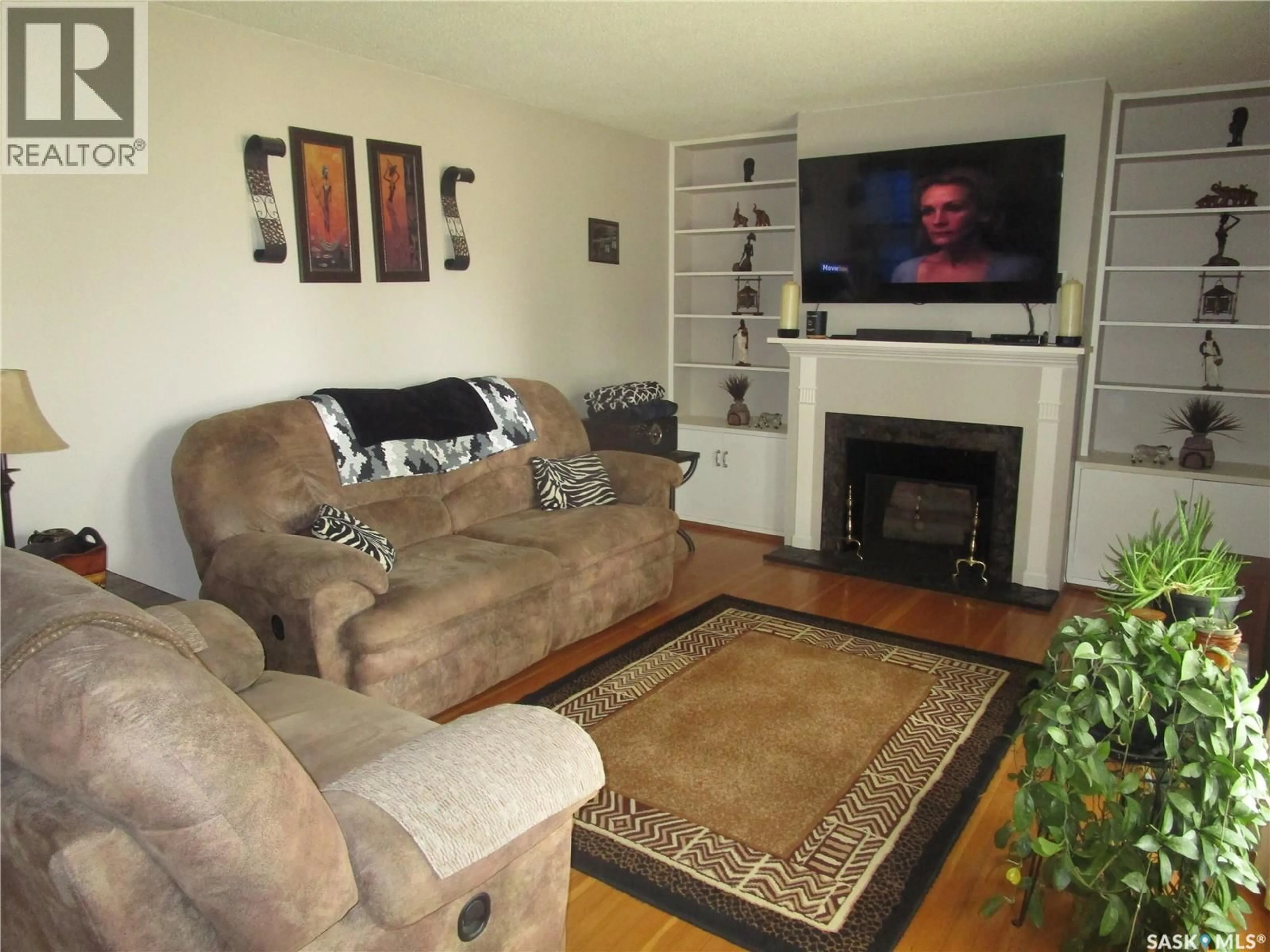 Living room with furniture, unknown for 100 BELL ROAD, Assiniboia Saskatchewan S0H0B0