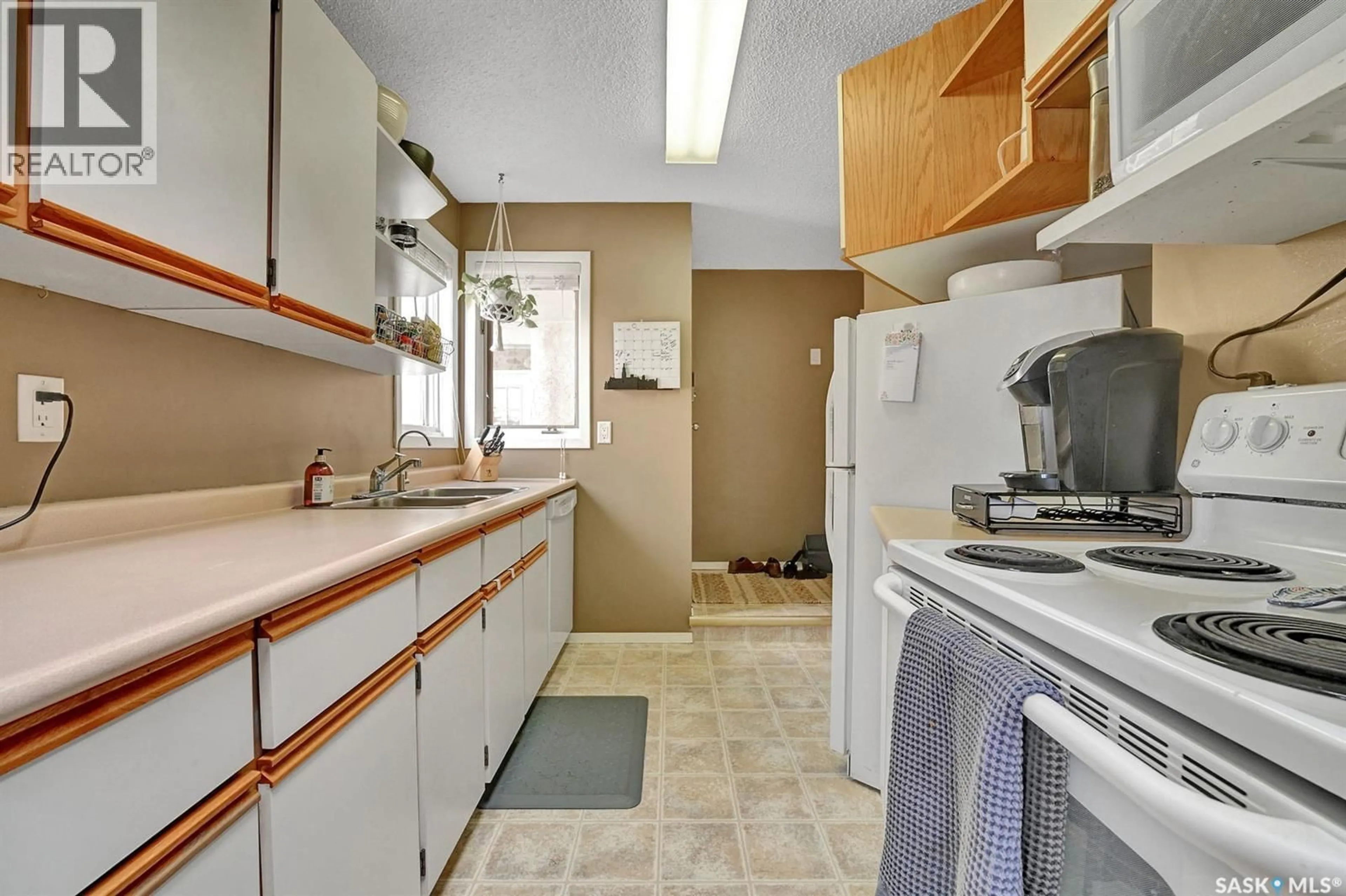 Standard kitchen, ceramic/tile floor for 5G NEILL PLACE, Regina Saskatchewan S4N2V4