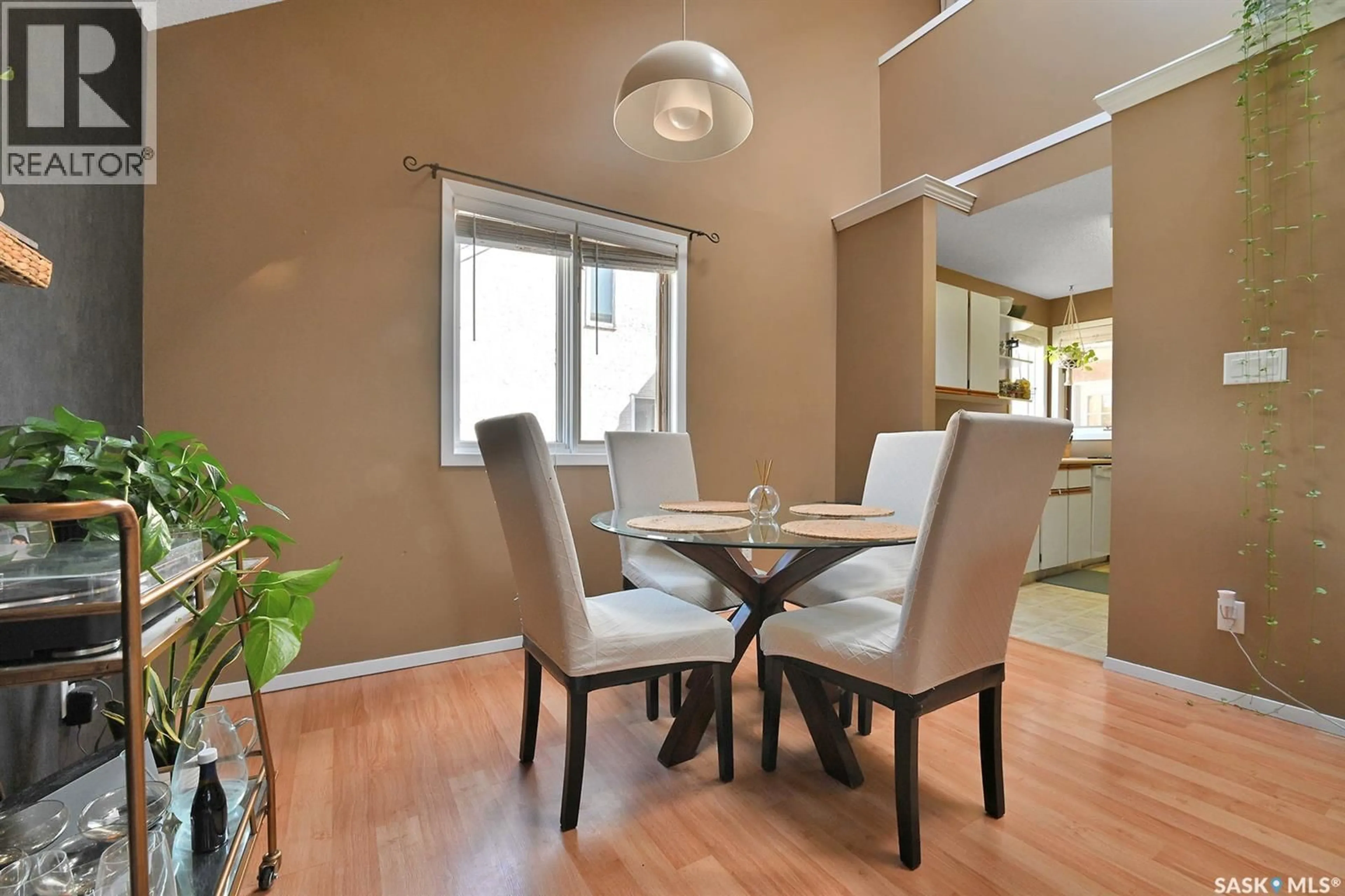 Dining room, wood/laminate floor for 5G NEILL PLACE, Regina Saskatchewan S4N2V4