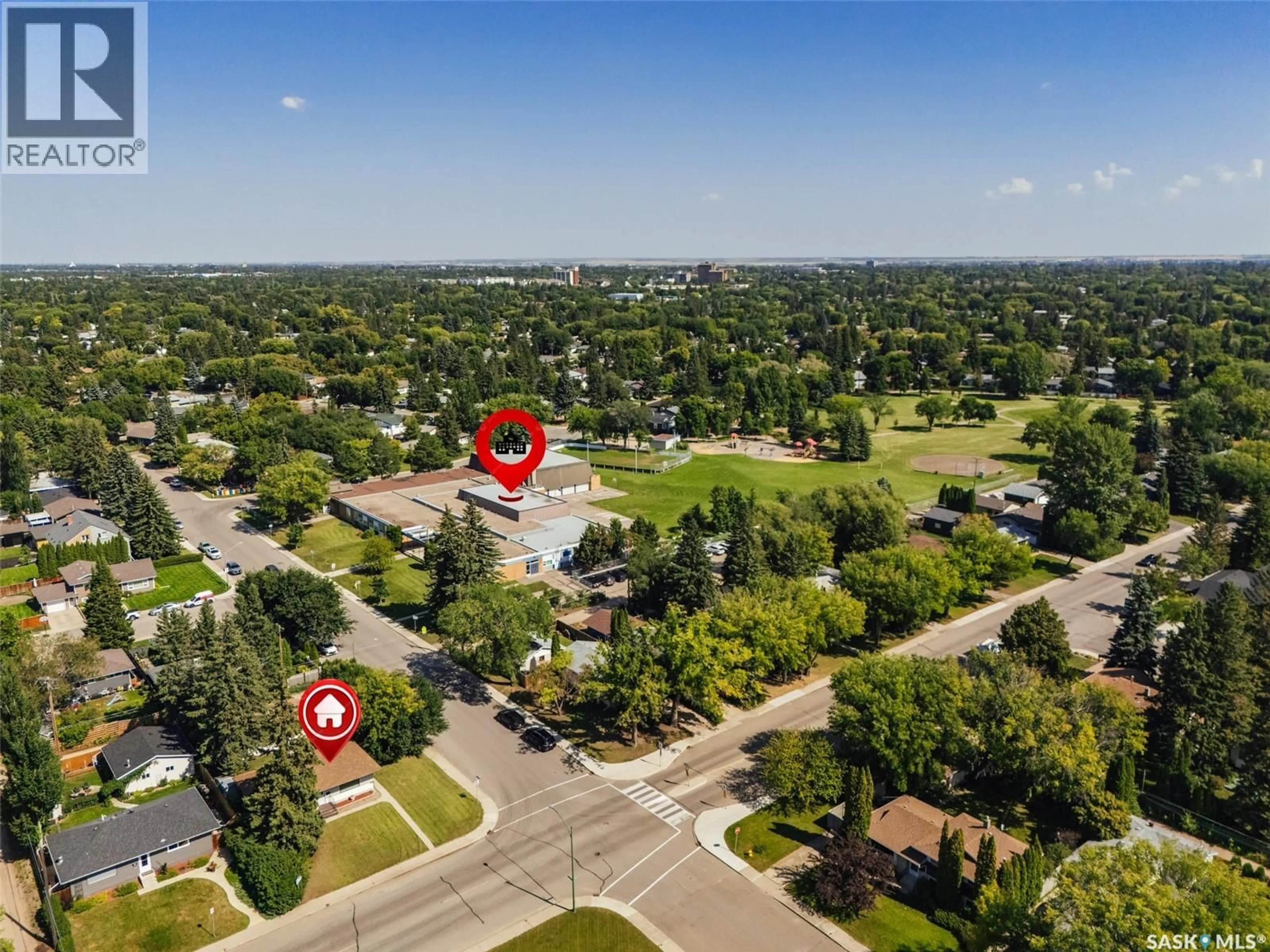 A pic from outside/outdoor area/front of a property/back of a property/a pic from drone, unknown for 1125 WILSON CRESCENT, Saskatoon Saskatchewan S7J2M7
